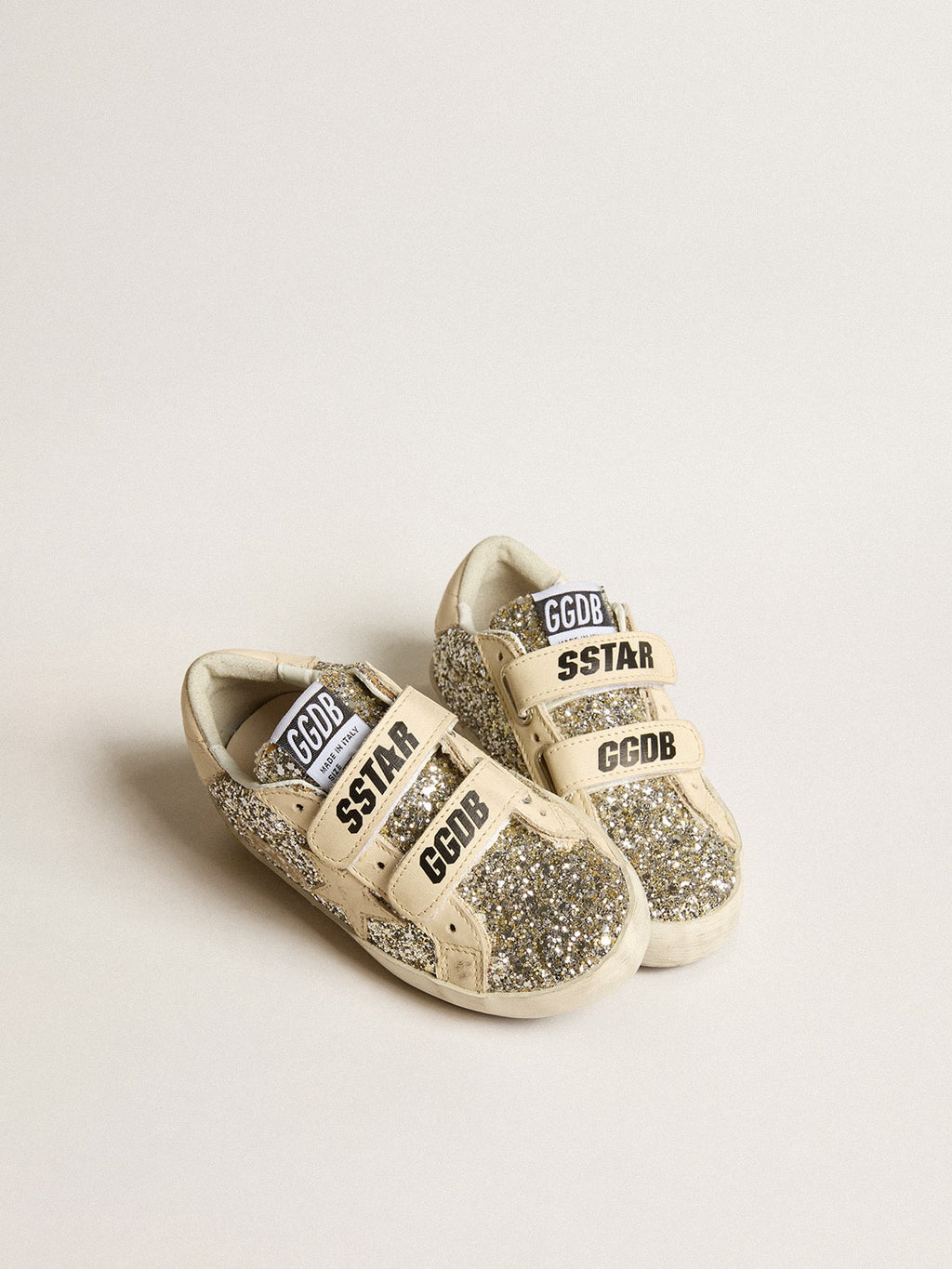 Old School Junior in platinum glitter with leather star and heel tab