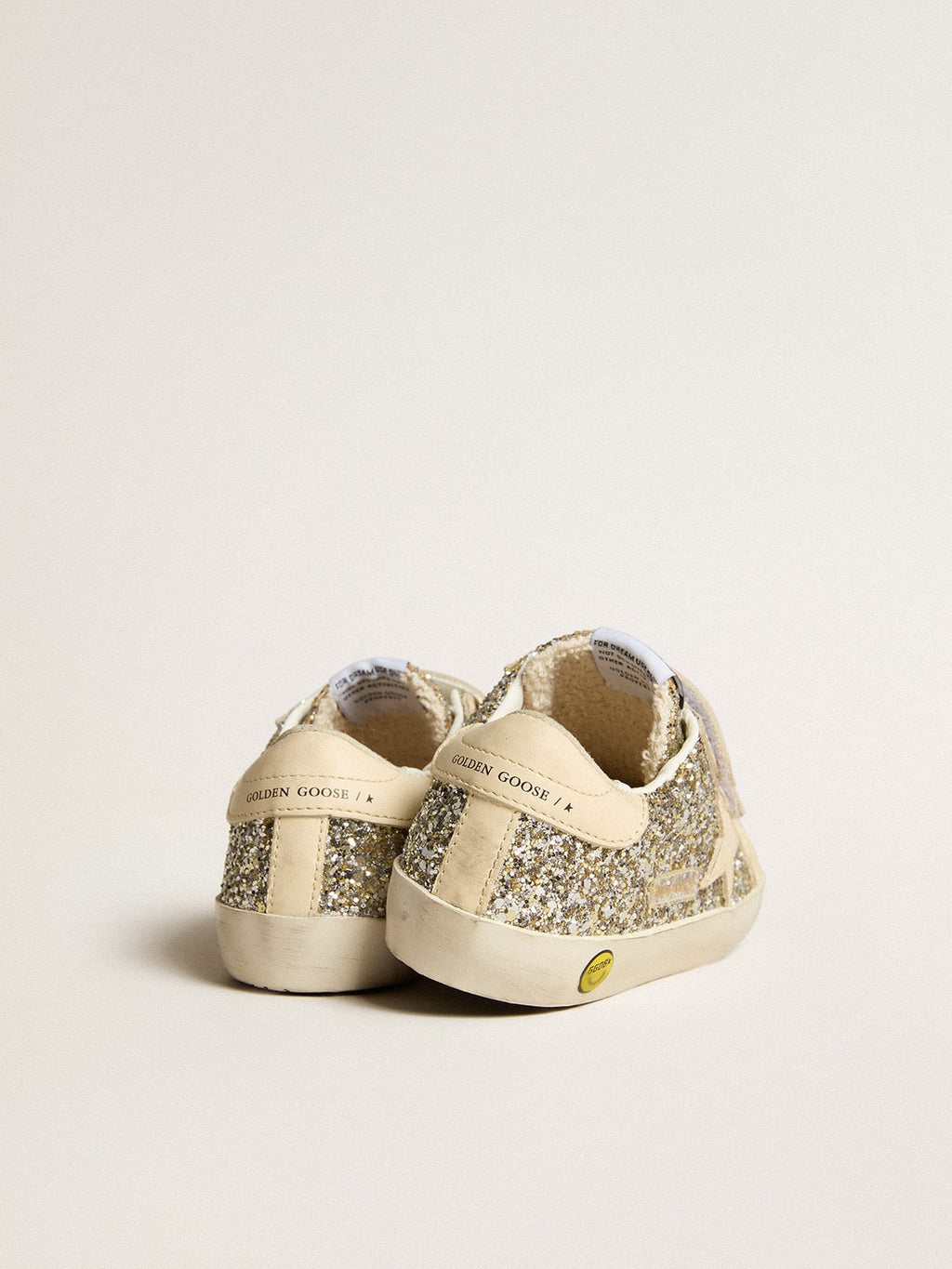 Old School Junior in platinum glitter with leather star and heel tab