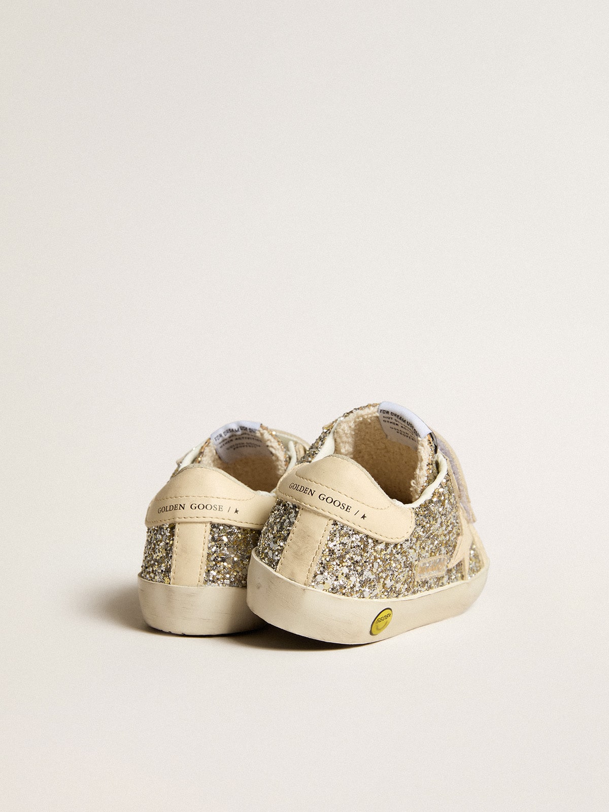 Old School Junior in platinum glitter with leather star and heel tab