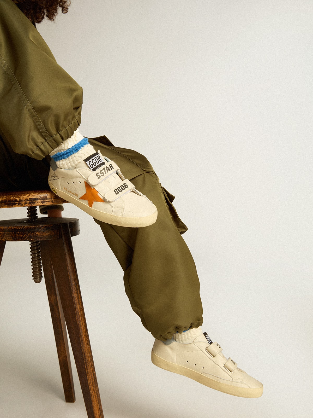 Junior Old School in leather with orange star and baby blue heel tab