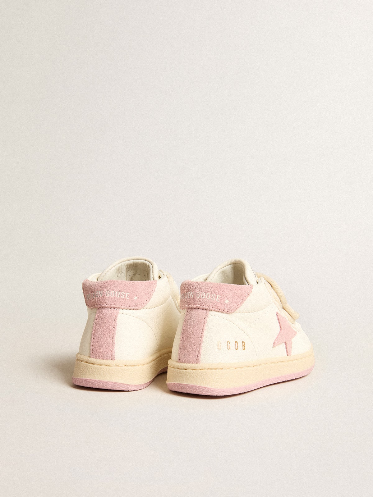June Junior in nappa leather with old rose suede star and heel tab