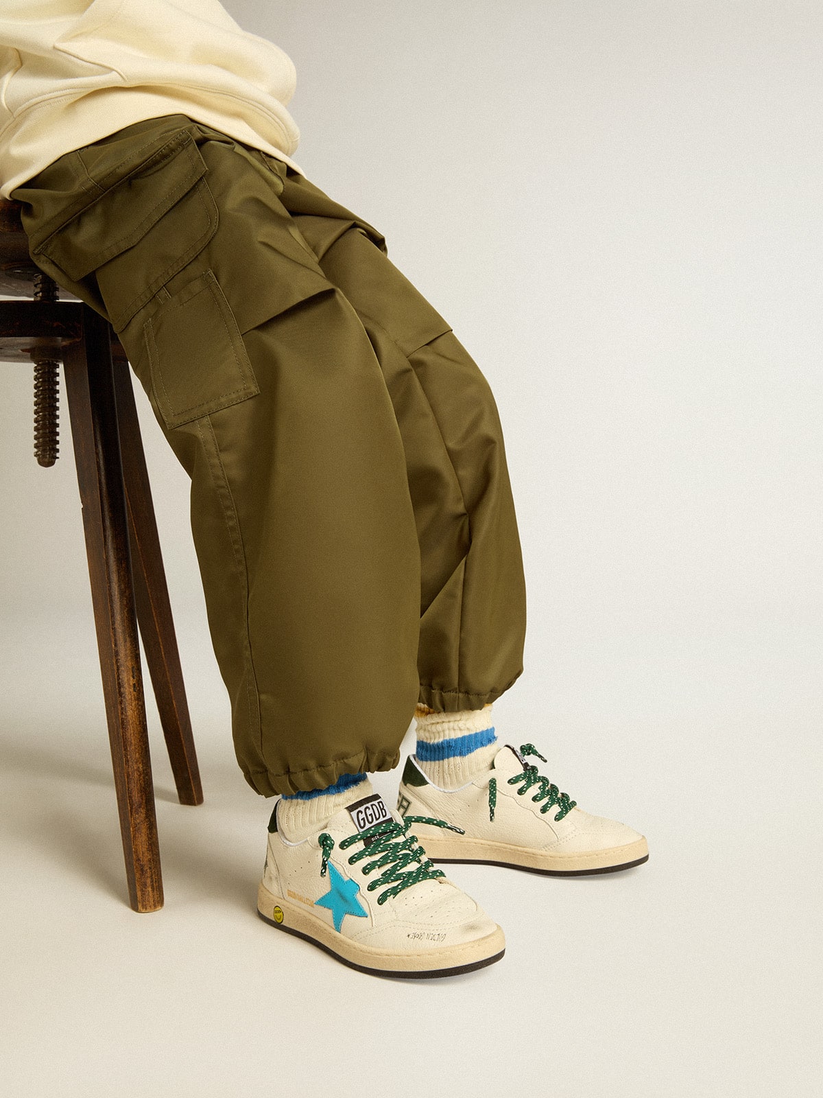 Junior Ball Star with turquoise star and green suede heel tab