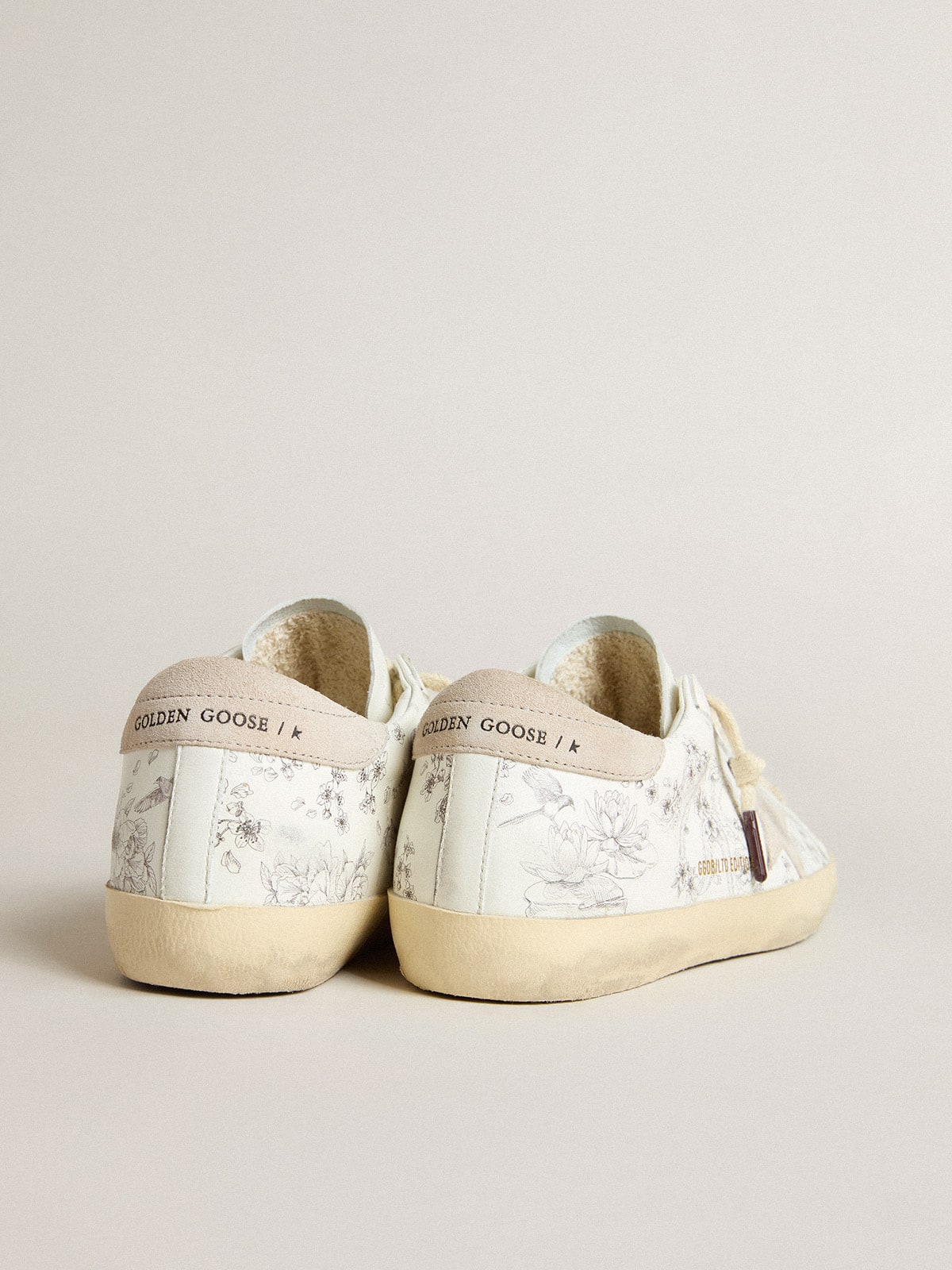 Men's Super-Star LTD CNY in white leather with lettering on the upper