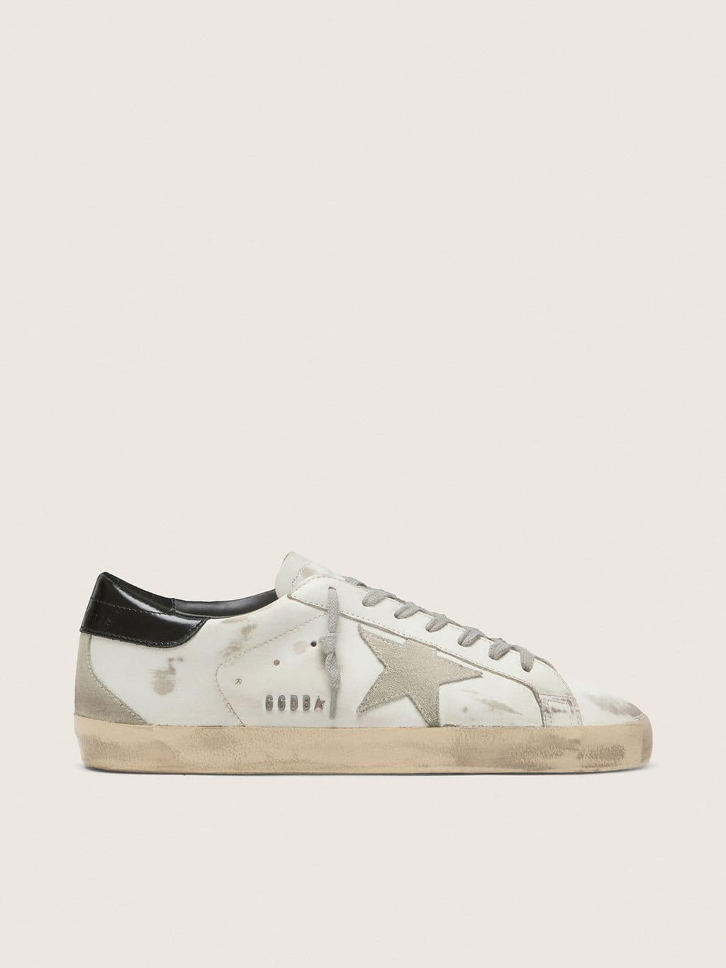 Men's Super-Star with black heel tab and metal stud lettering