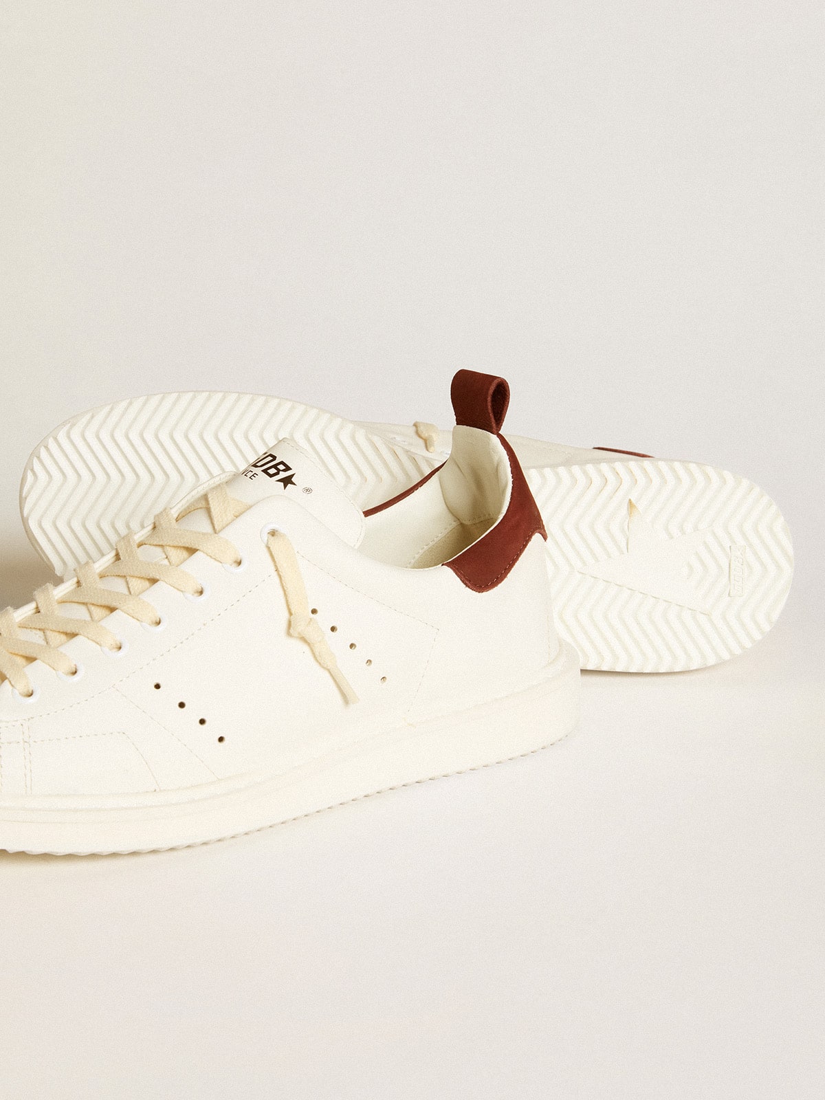 Men's Starter LTD in white leather with burgundy nubuck heel tab