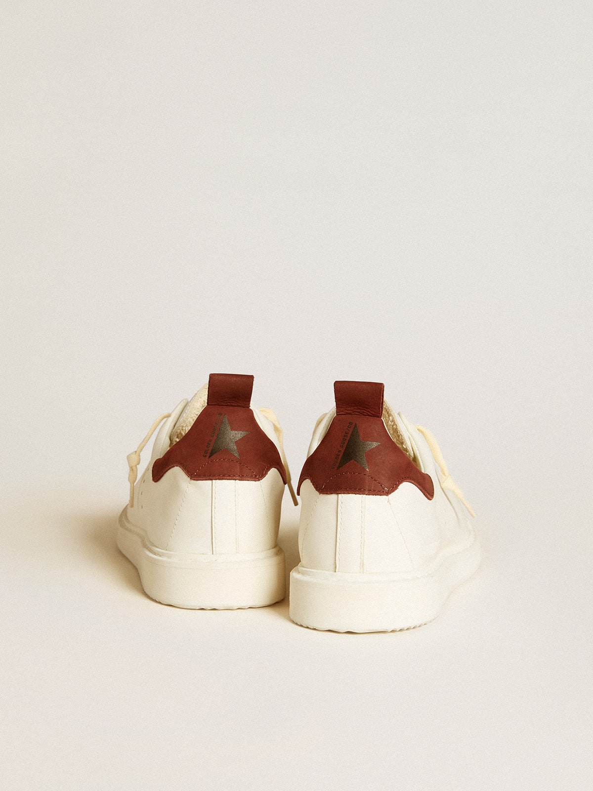 Men's Starter LTD in white leather with burgundy nubuck heel tab