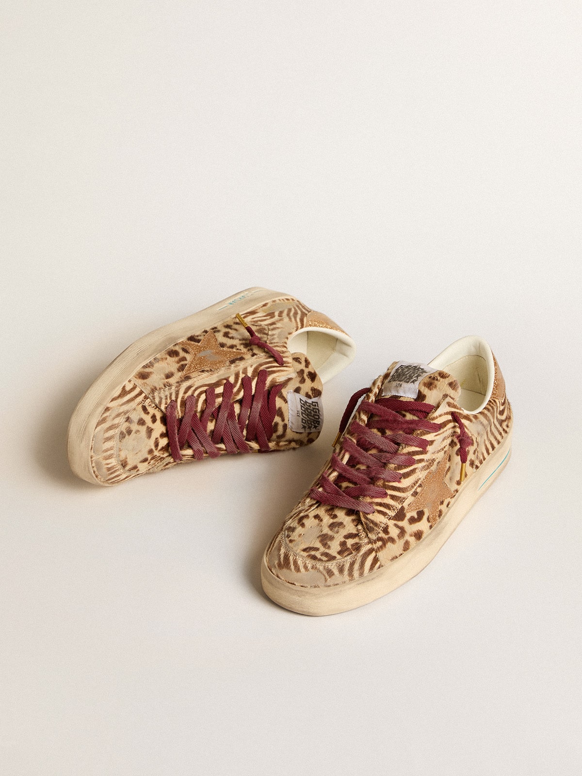 Men's Stardan LTD in animal-print pony skin with gold glitter star