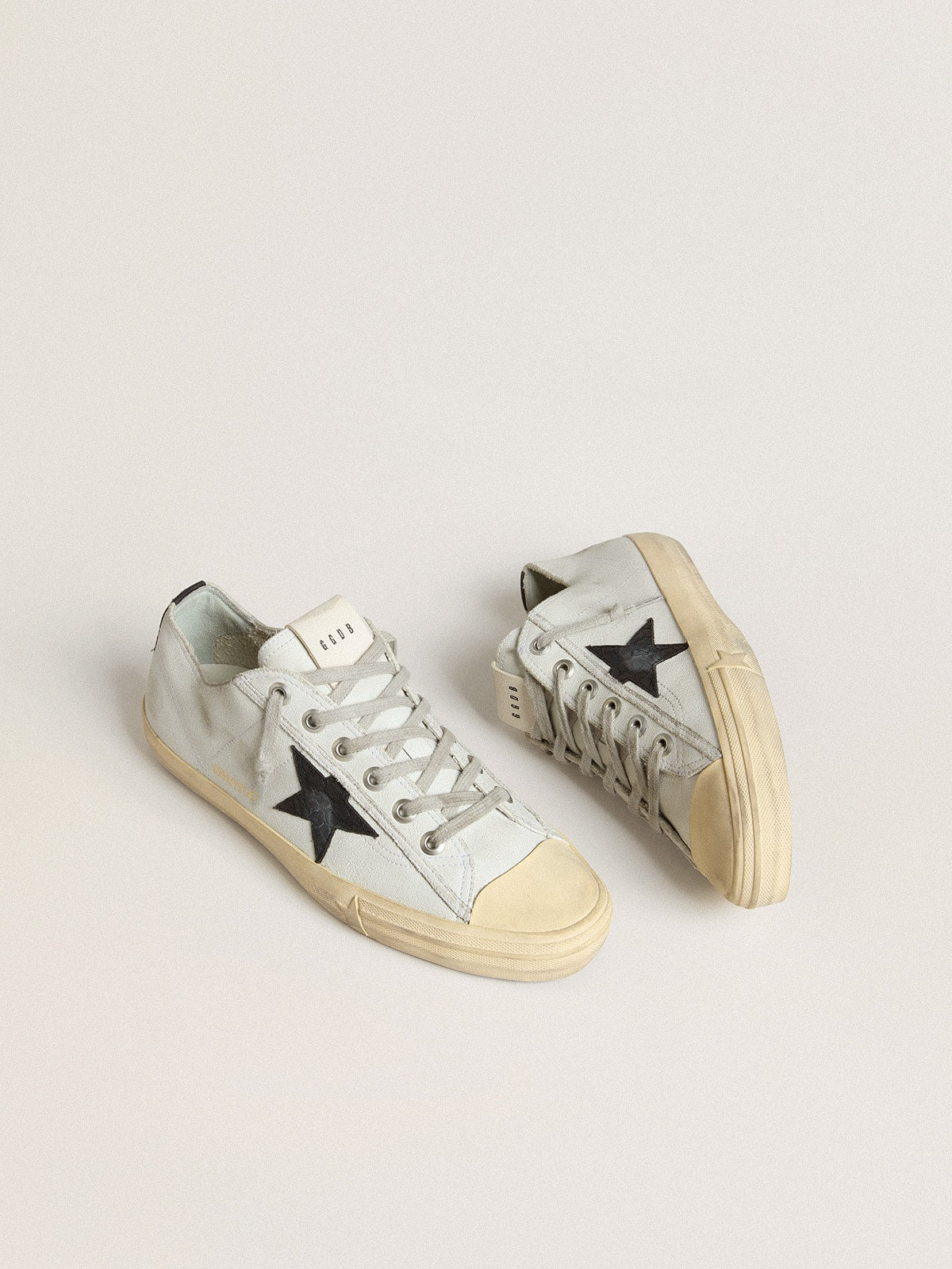 V-Star in leather with black crocodile-print leather star and heel tab