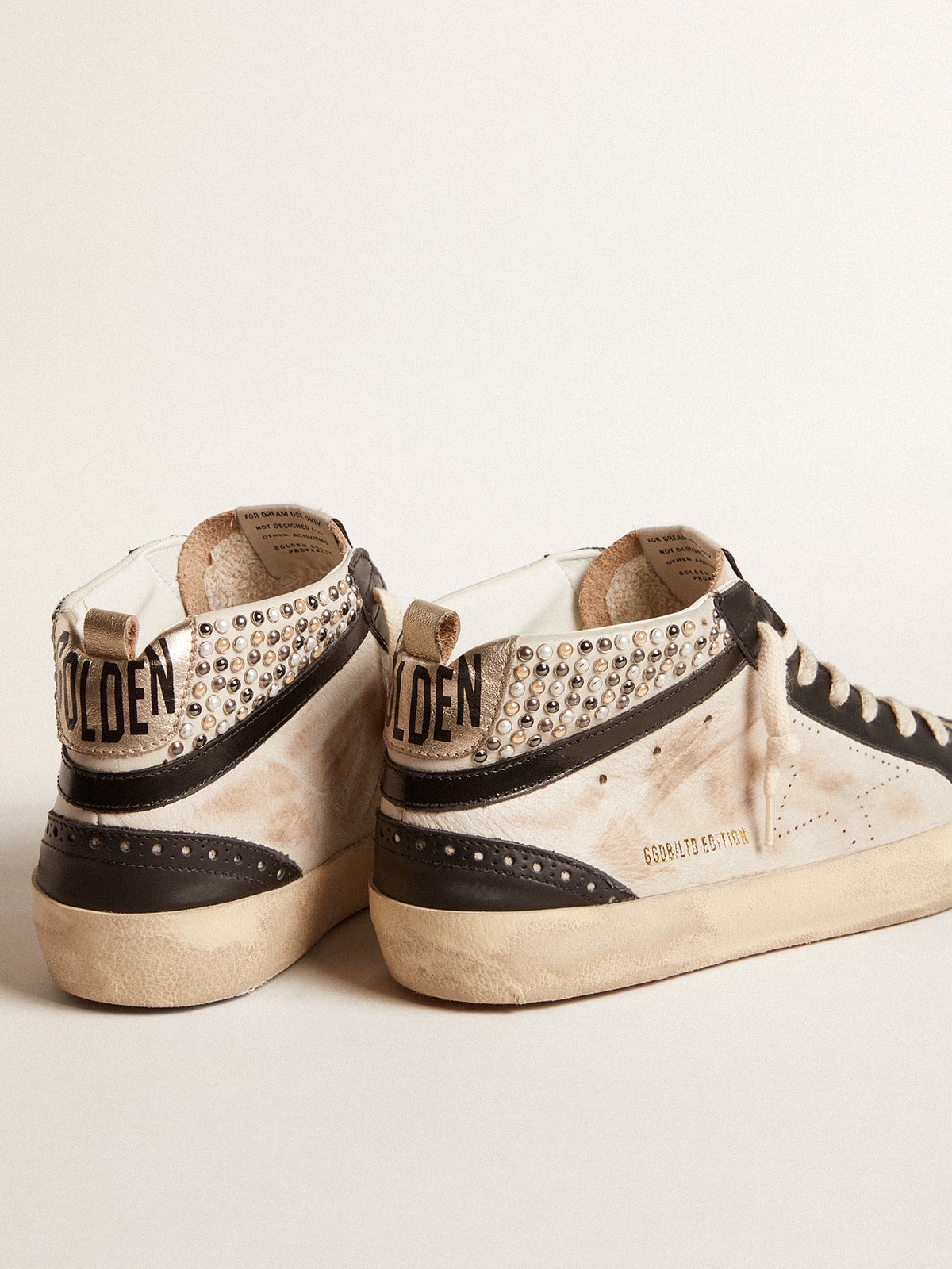 Men's Mid Star LTD in black and white leather with pearls and perforated star