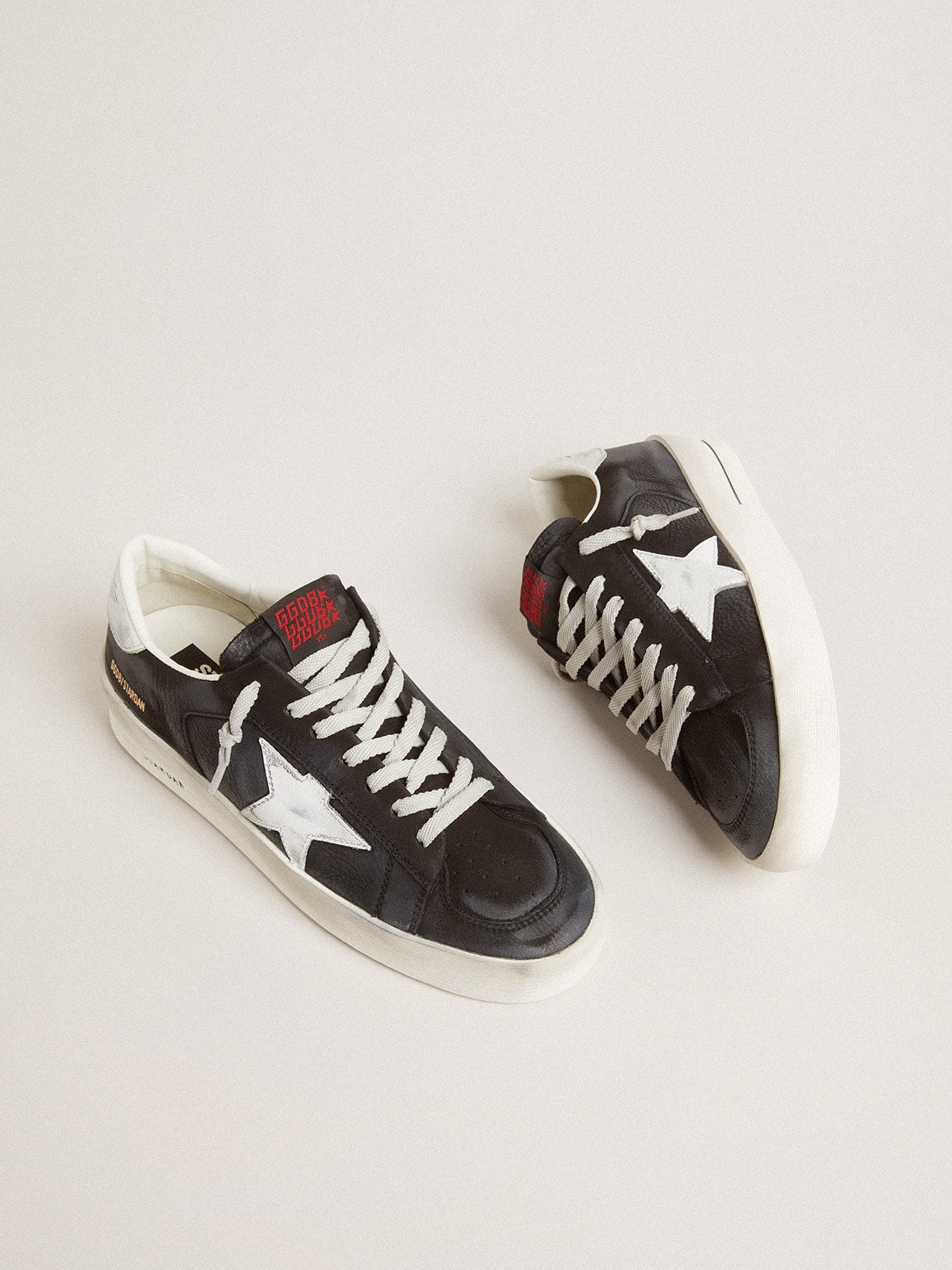Stardan in black nubuck and mesh with gray leather star and heel tab