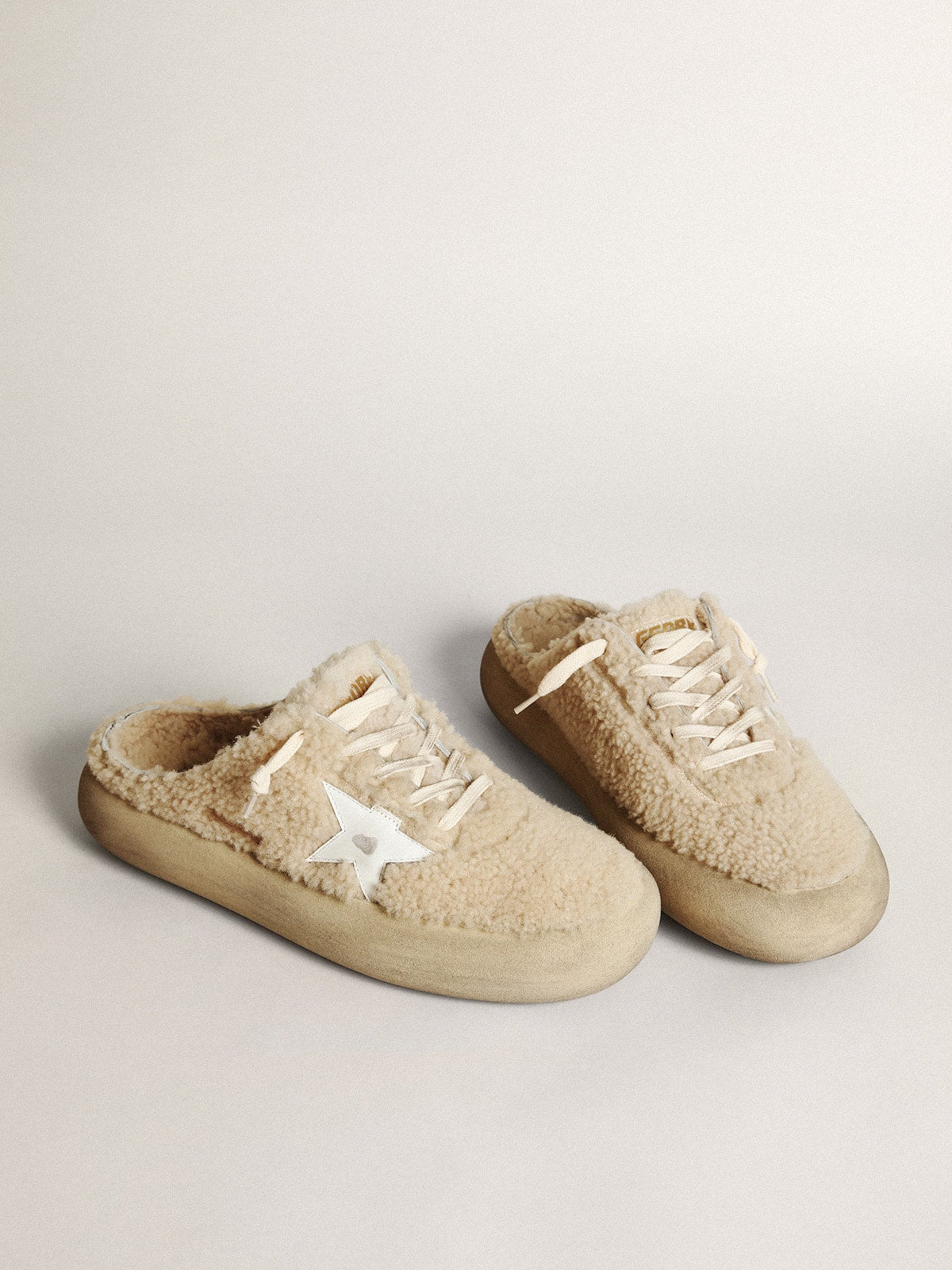 Men's Space-Star Sabots in beige shearling with white leather star