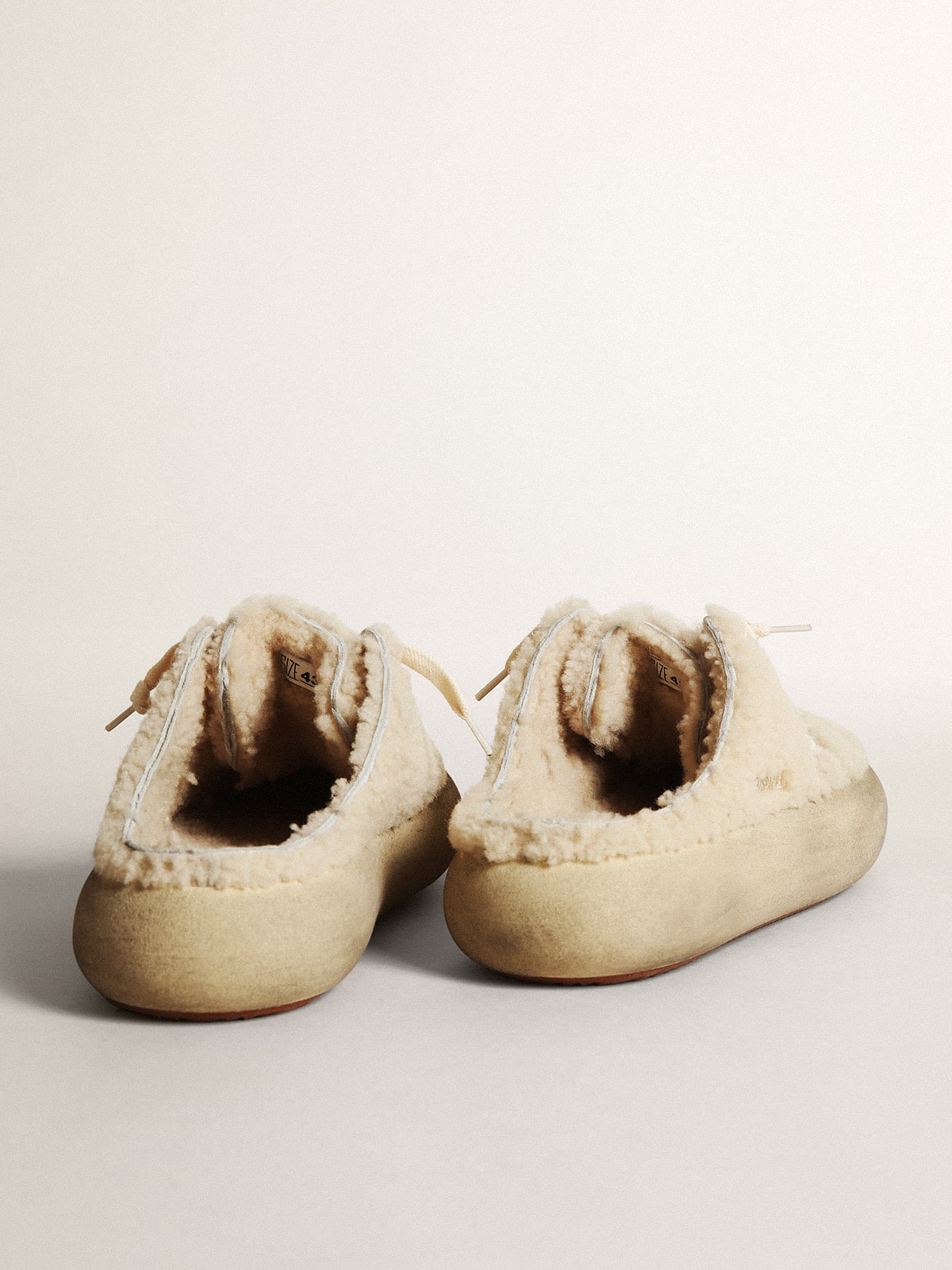Men's Space-Star Sabots in beige shearling with white leather star