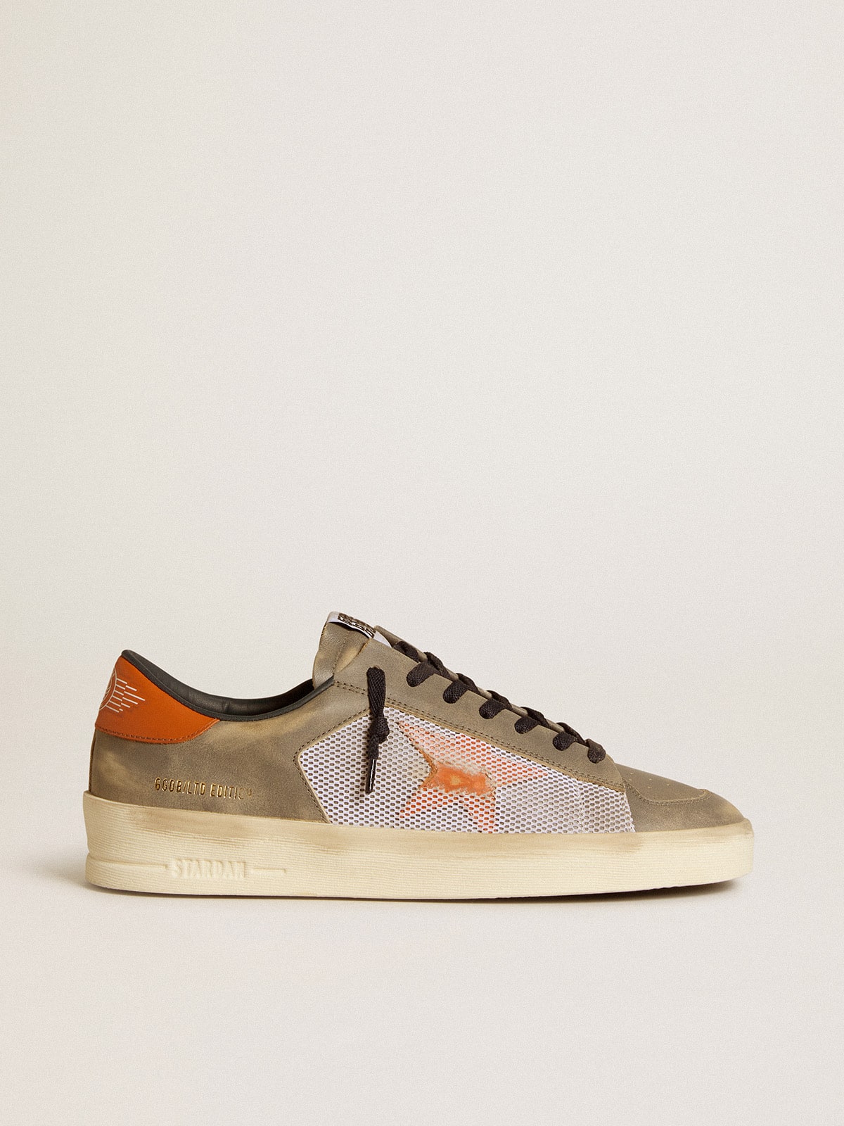 Stardan LTD in gray leather and mesh with leather star and heel tab