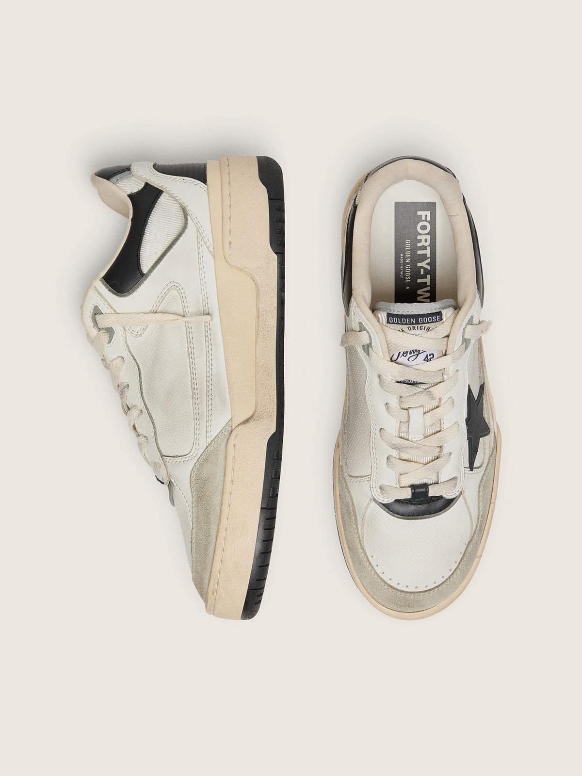Men's Forty2 with black star and black leather heel tab