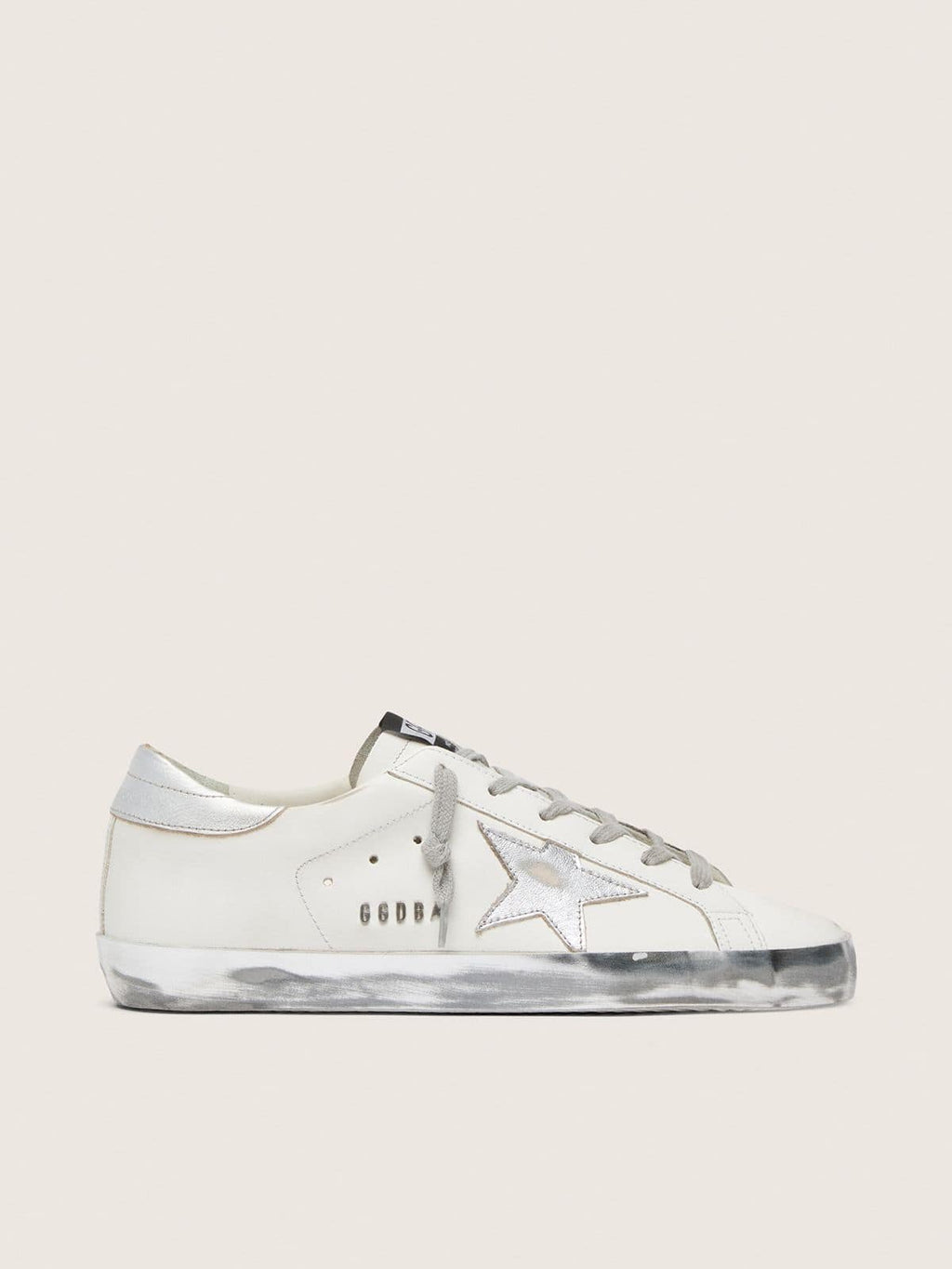 Women's Super-Star with silver sparkle foxing and metal stud lettering
