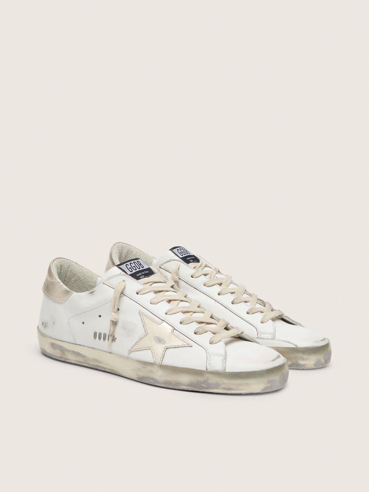 Women's Super-Star with gold sparkle foxing and metal stud lettering