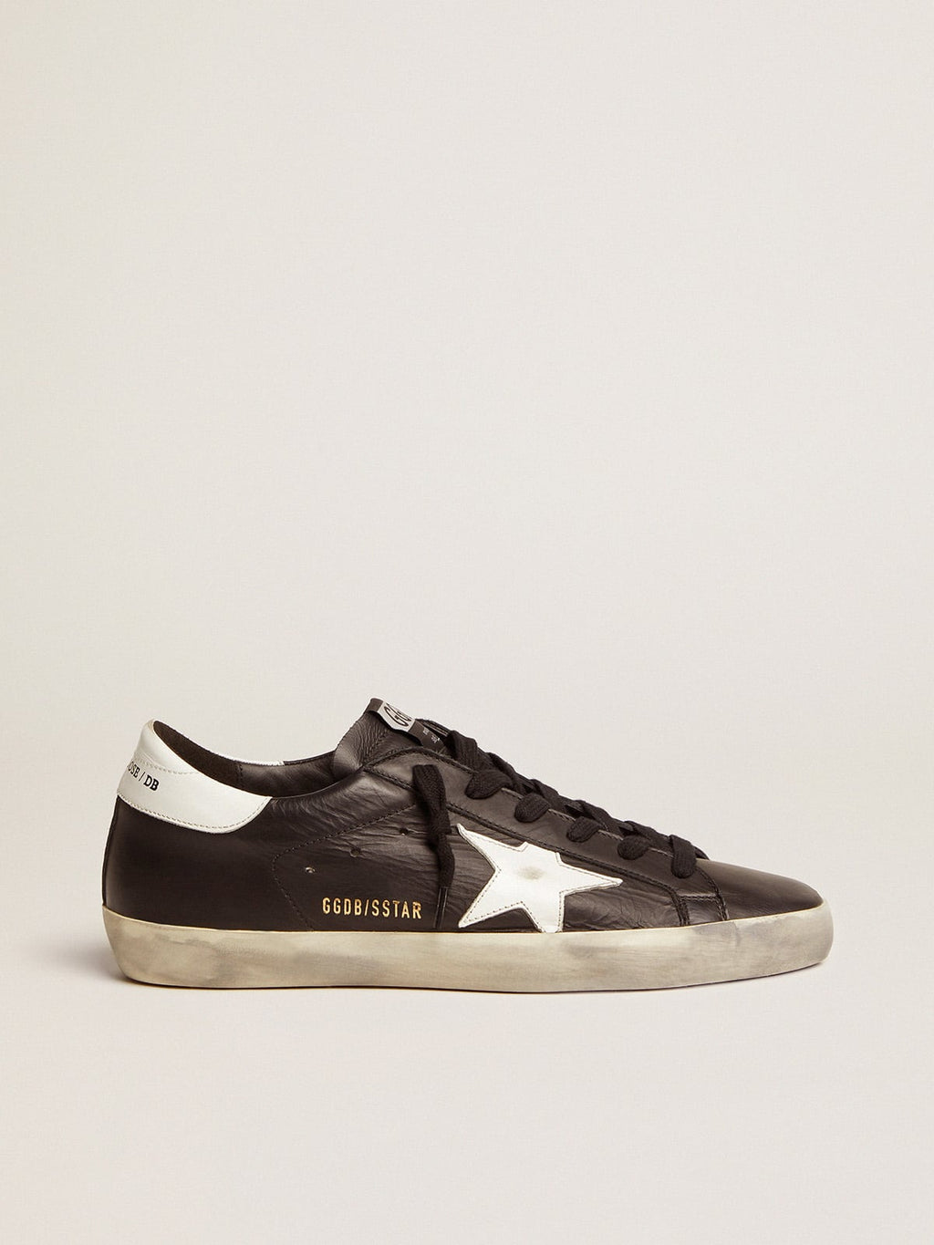 Women's Super-Star in black leather with white leather star and heel tab