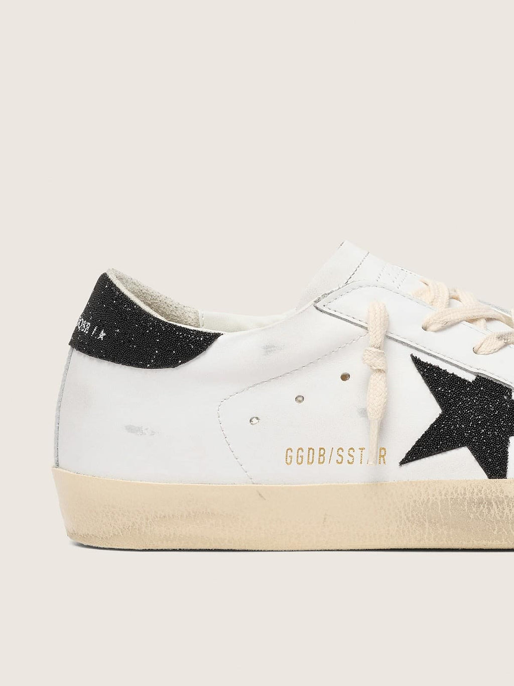 Women's Super-Star with a black Swarovski crystal star and heel tab