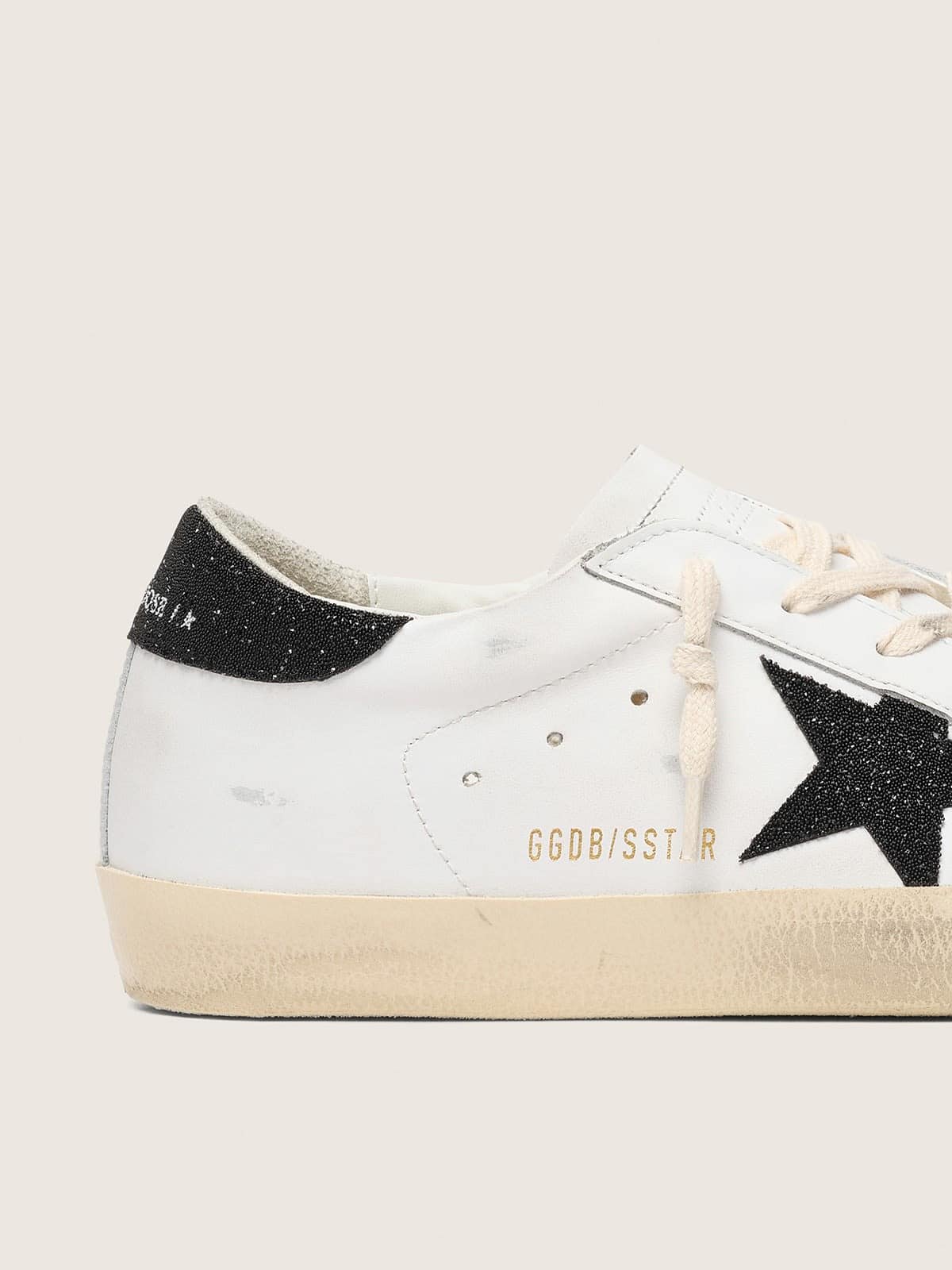 Women's Super-Star with a black Swarovski crystal star and heel tab