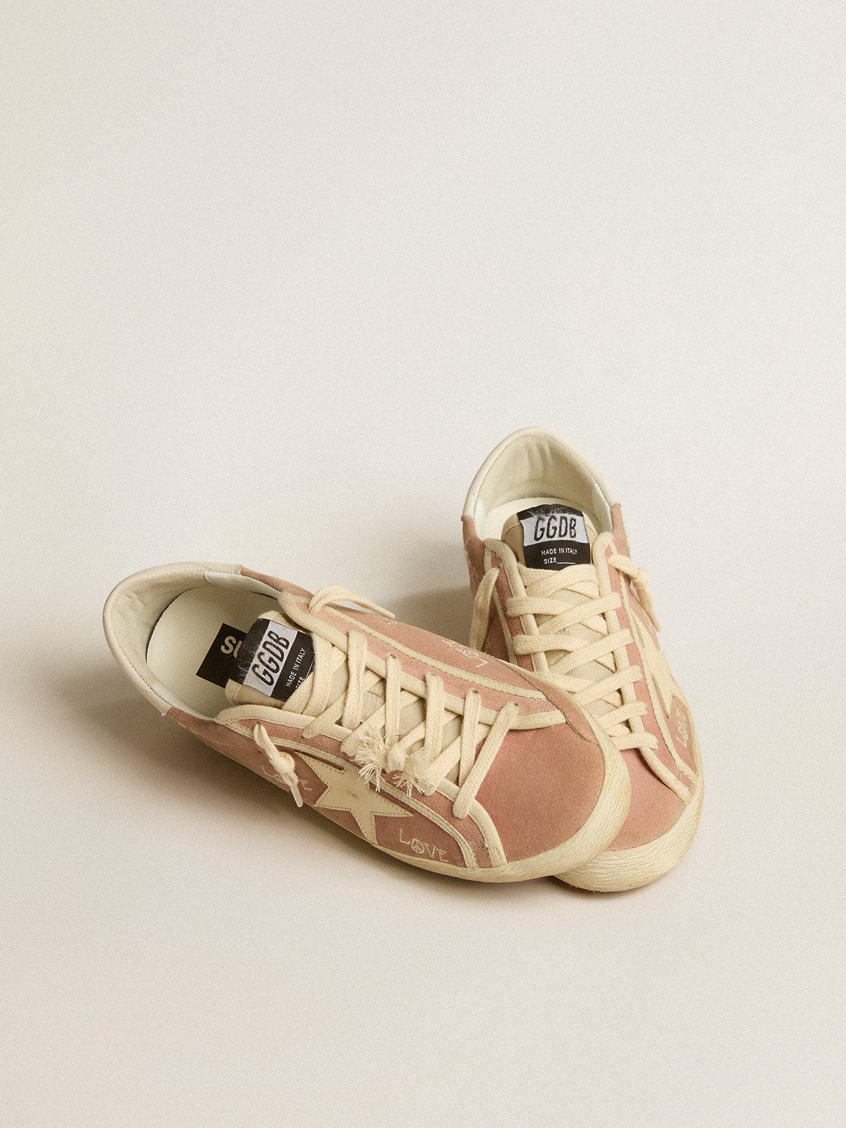 Super-Star in powder-pink suede with cream leather star