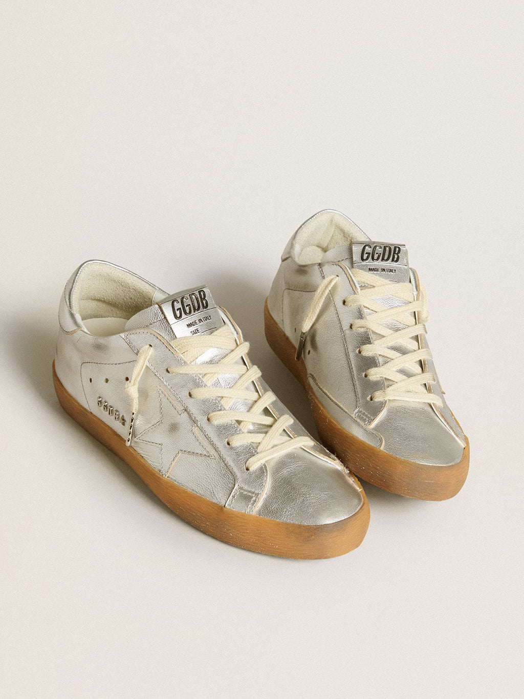 Super-Star in silver metallic leather with leather star and heel tab