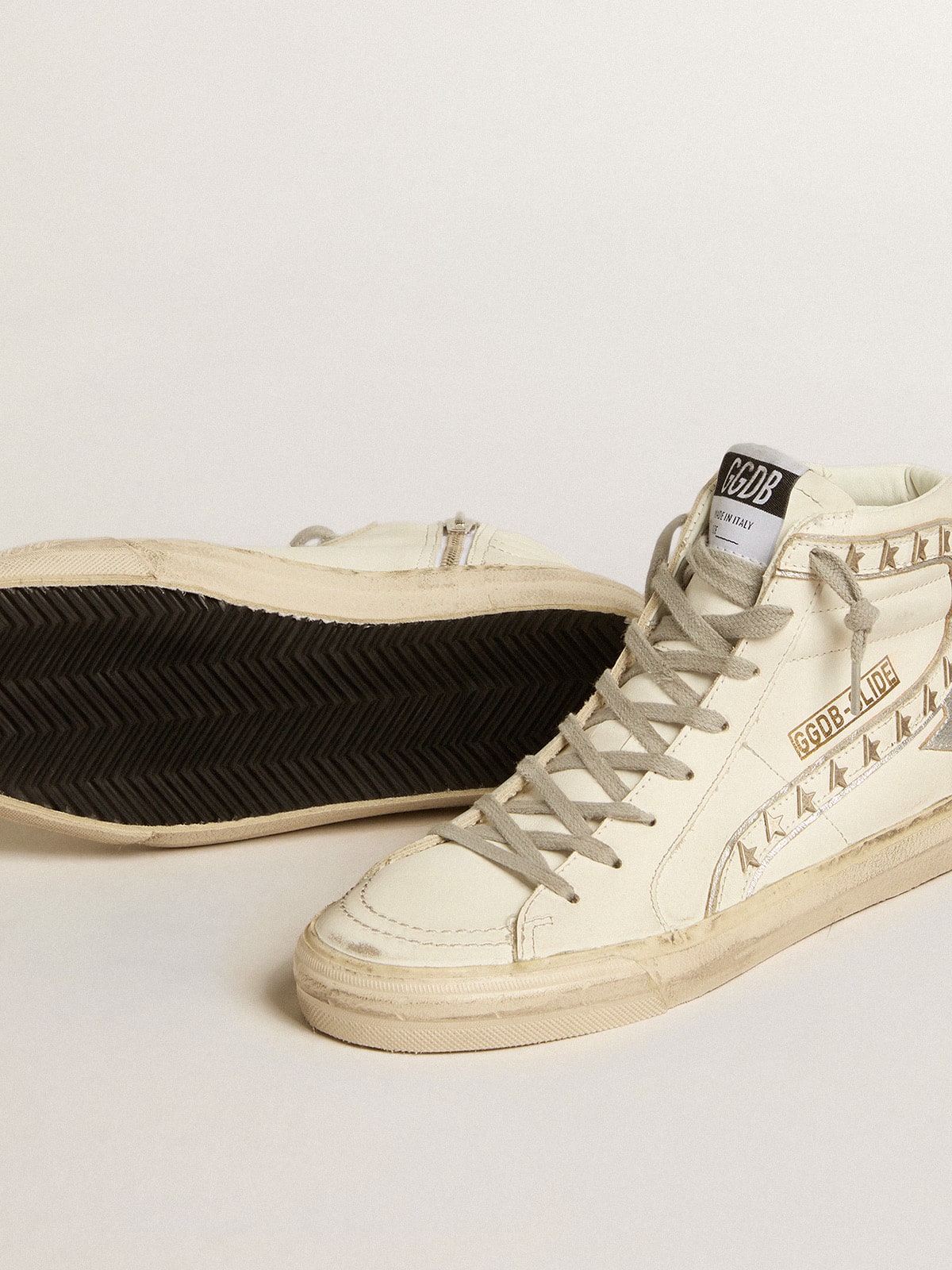 Slide with silver metallic leather star and leather flash with stars