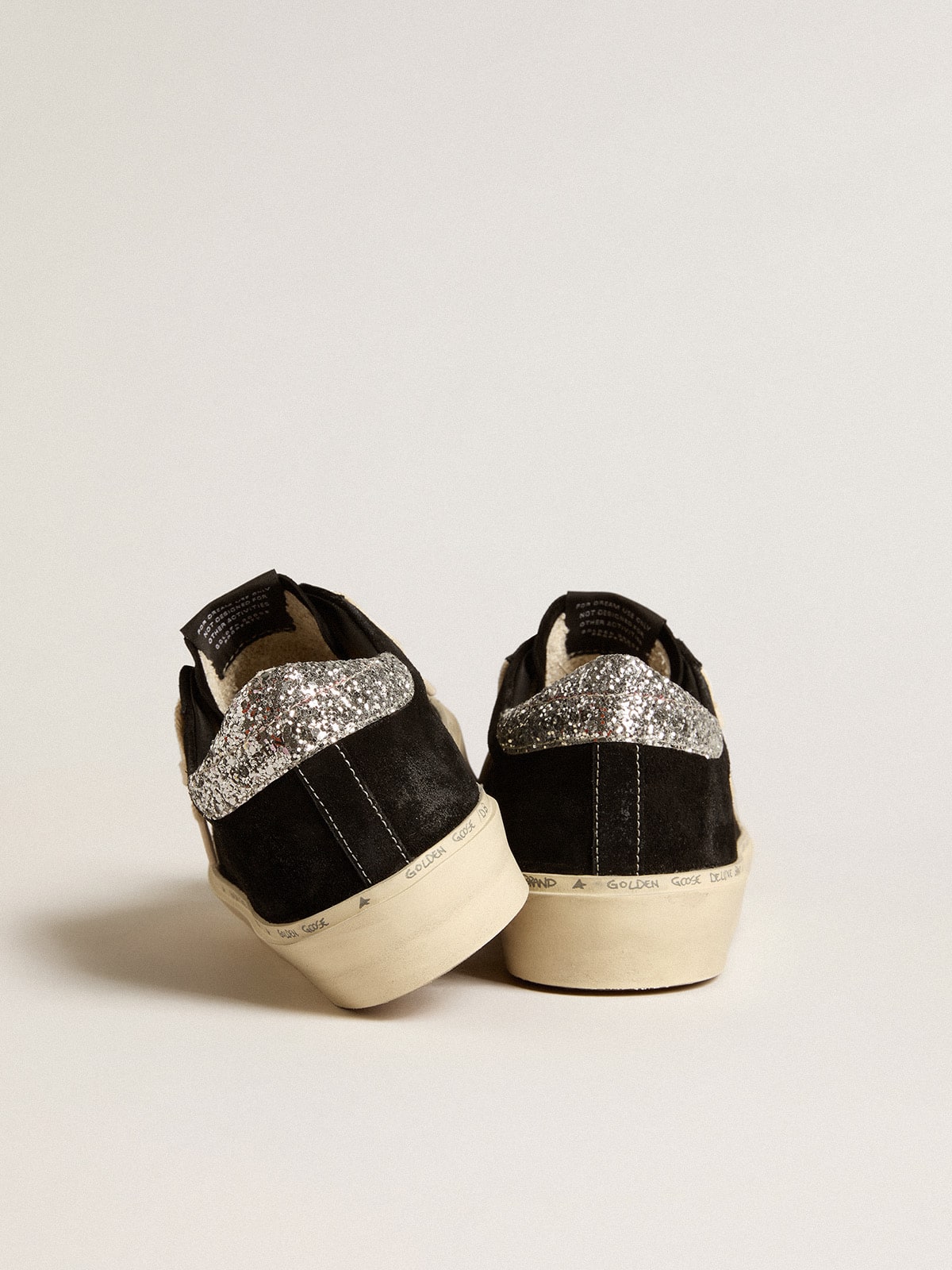 Women's Hi Star in black leather with silver glitter heel tab