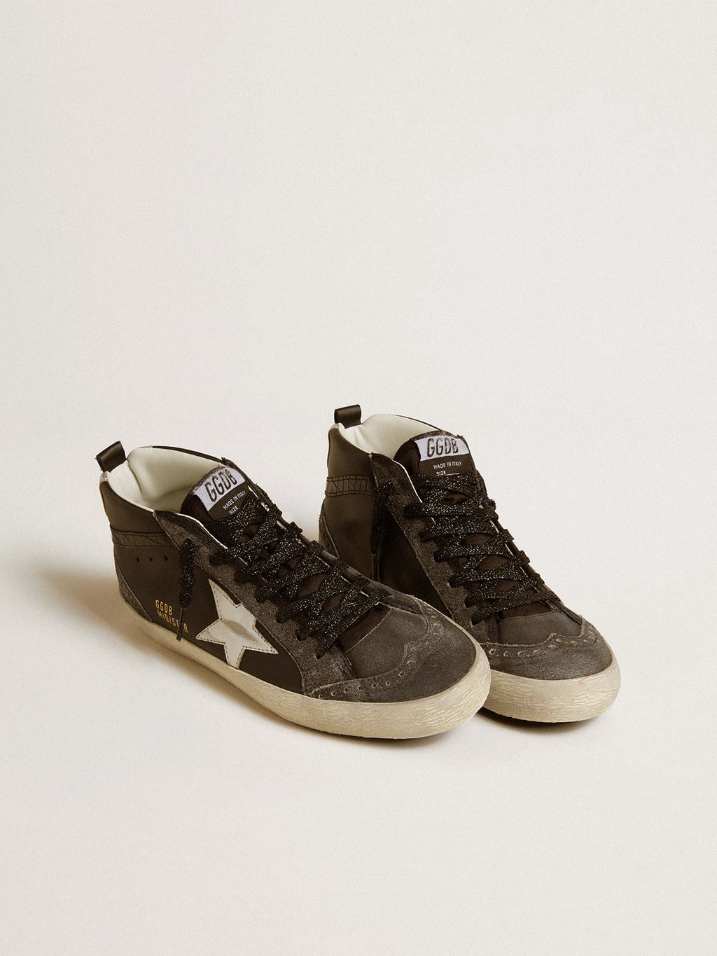Women's Mid Star in black leather with silver metallic leather star