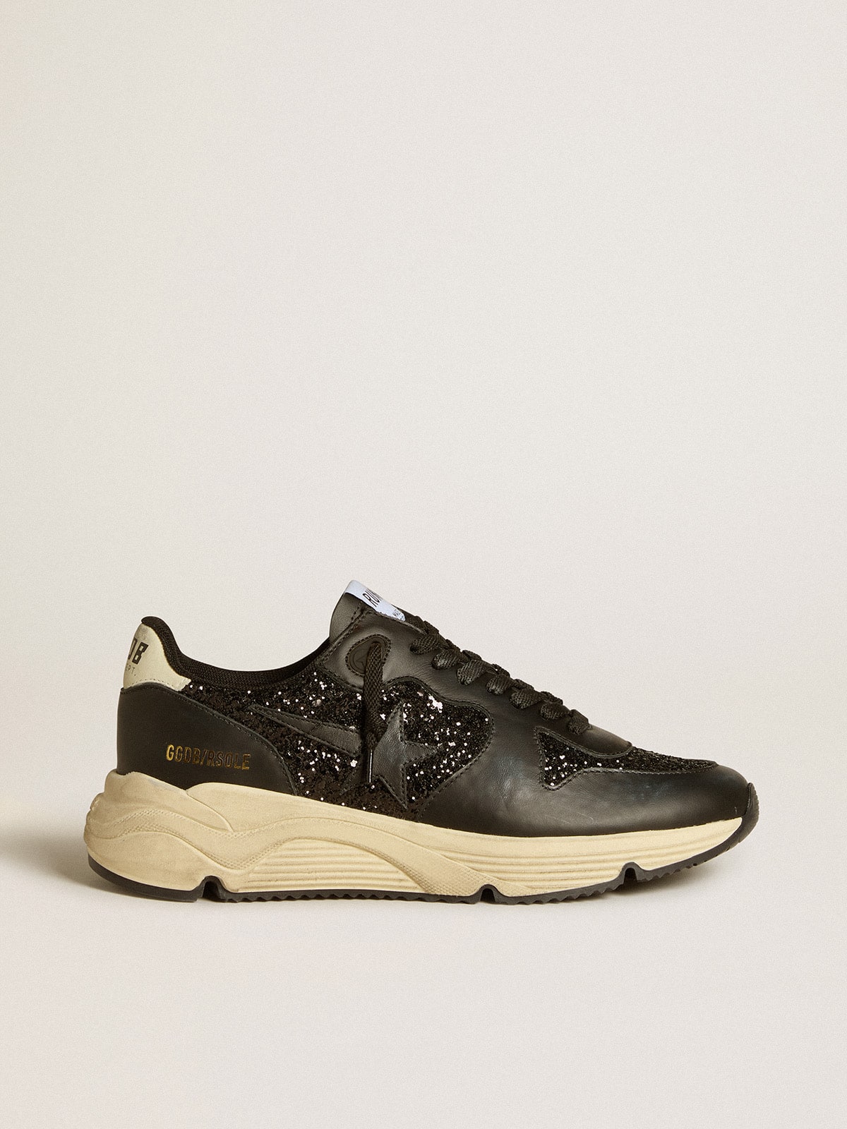 Women's Running Sole in black glitter with leather star and nubuck heel tab