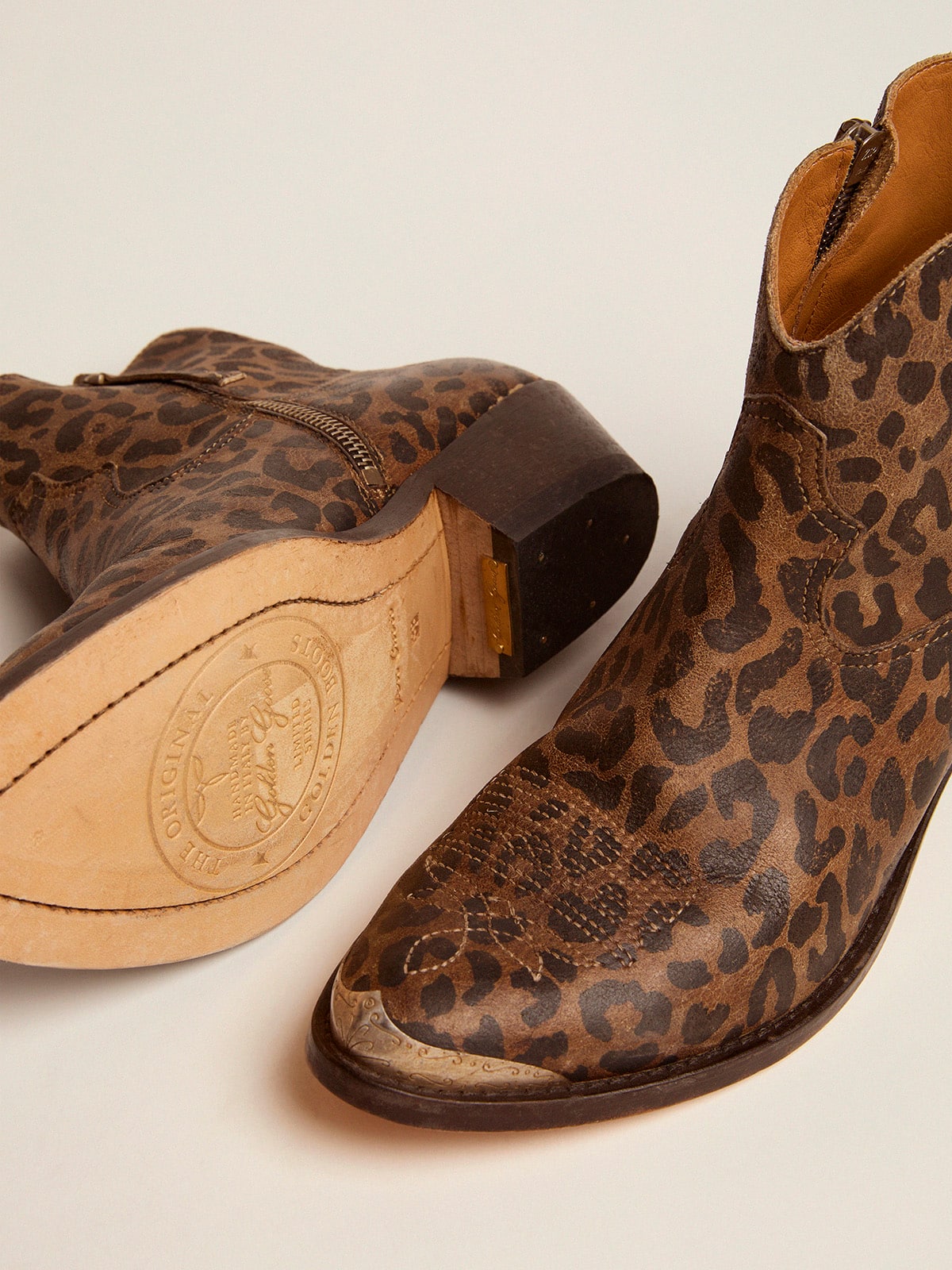 Women's leather ankle boots with leopard print