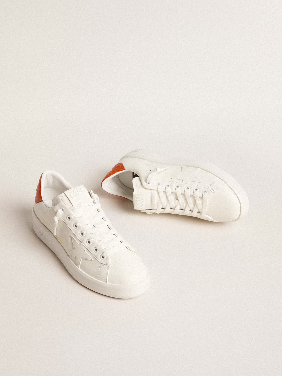 Women's Purestar with white leather star and orange heel tab