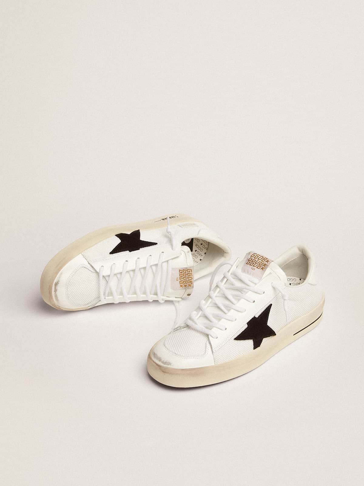 Stardan with white leather and mesh inserts and black suede star