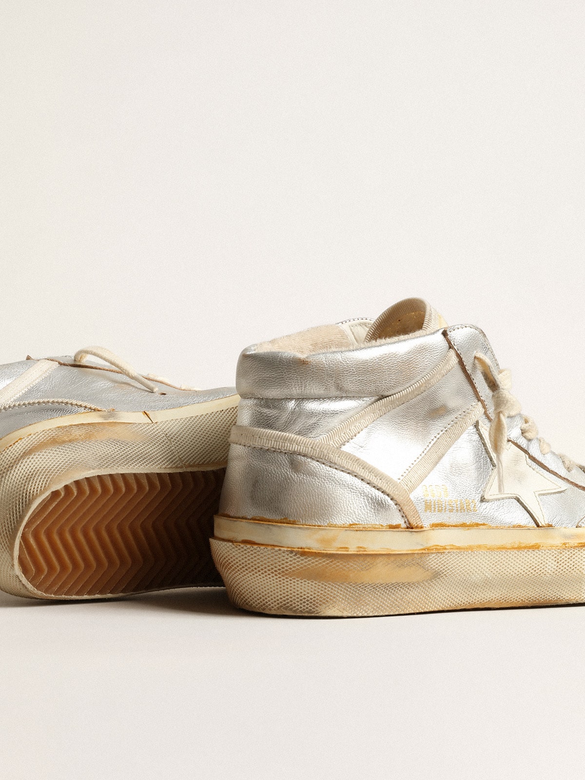 Women's Mid Star in silver metallic leather with ivory star