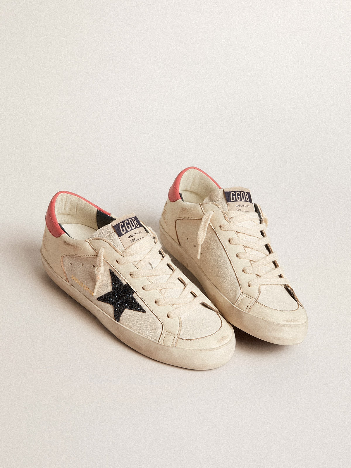 Women's Super-Star LTD in nappa with blue glitter star and red heel tab