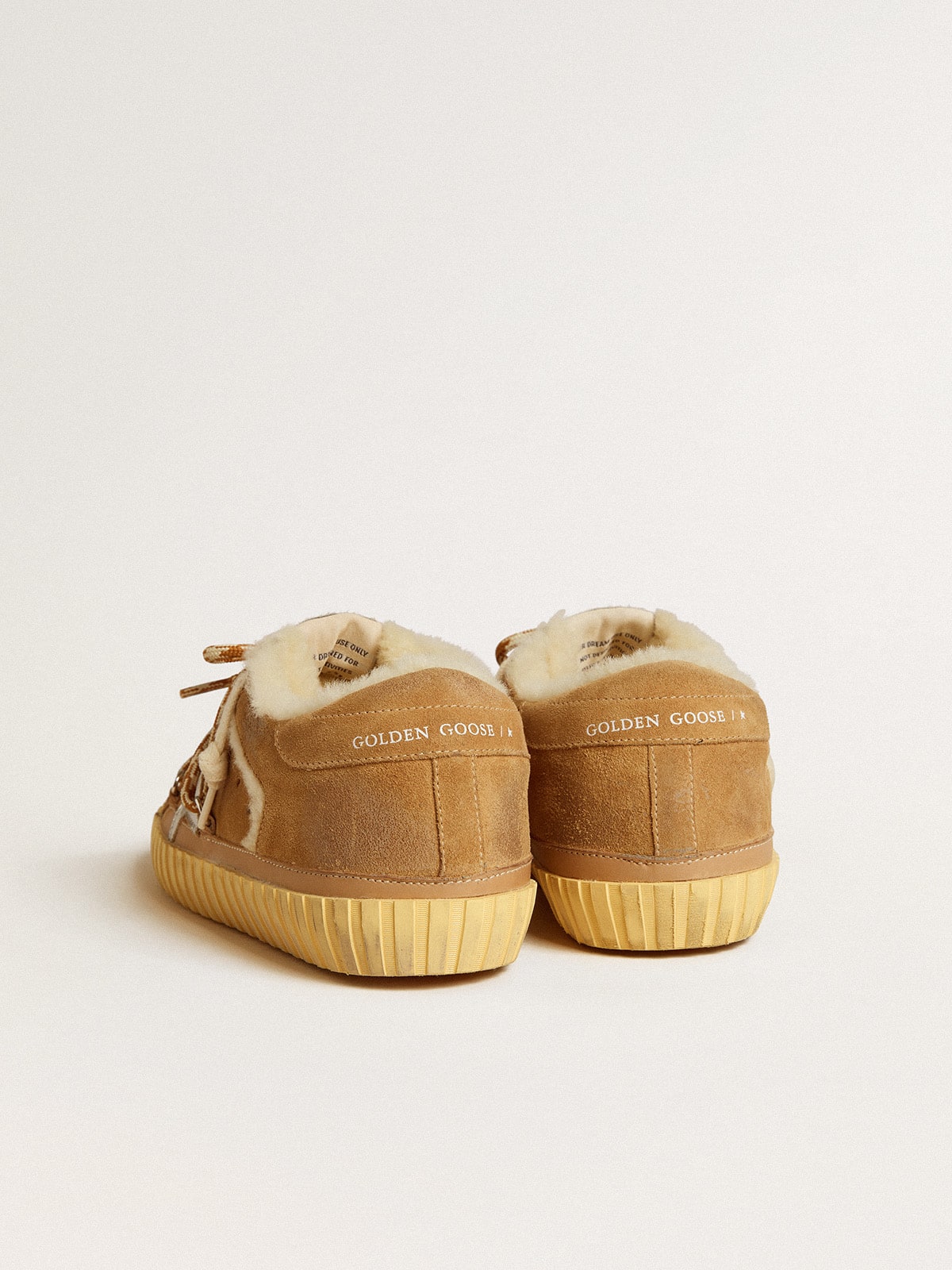 Super-Star in beige suede and shearling with metallic leather star