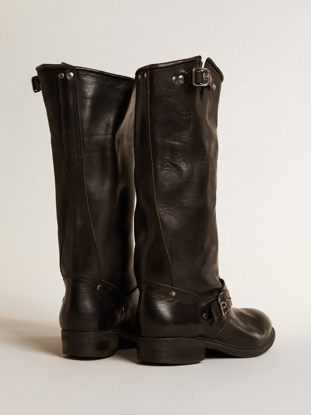 High Biker boots in black leather with silver studs and buckles
