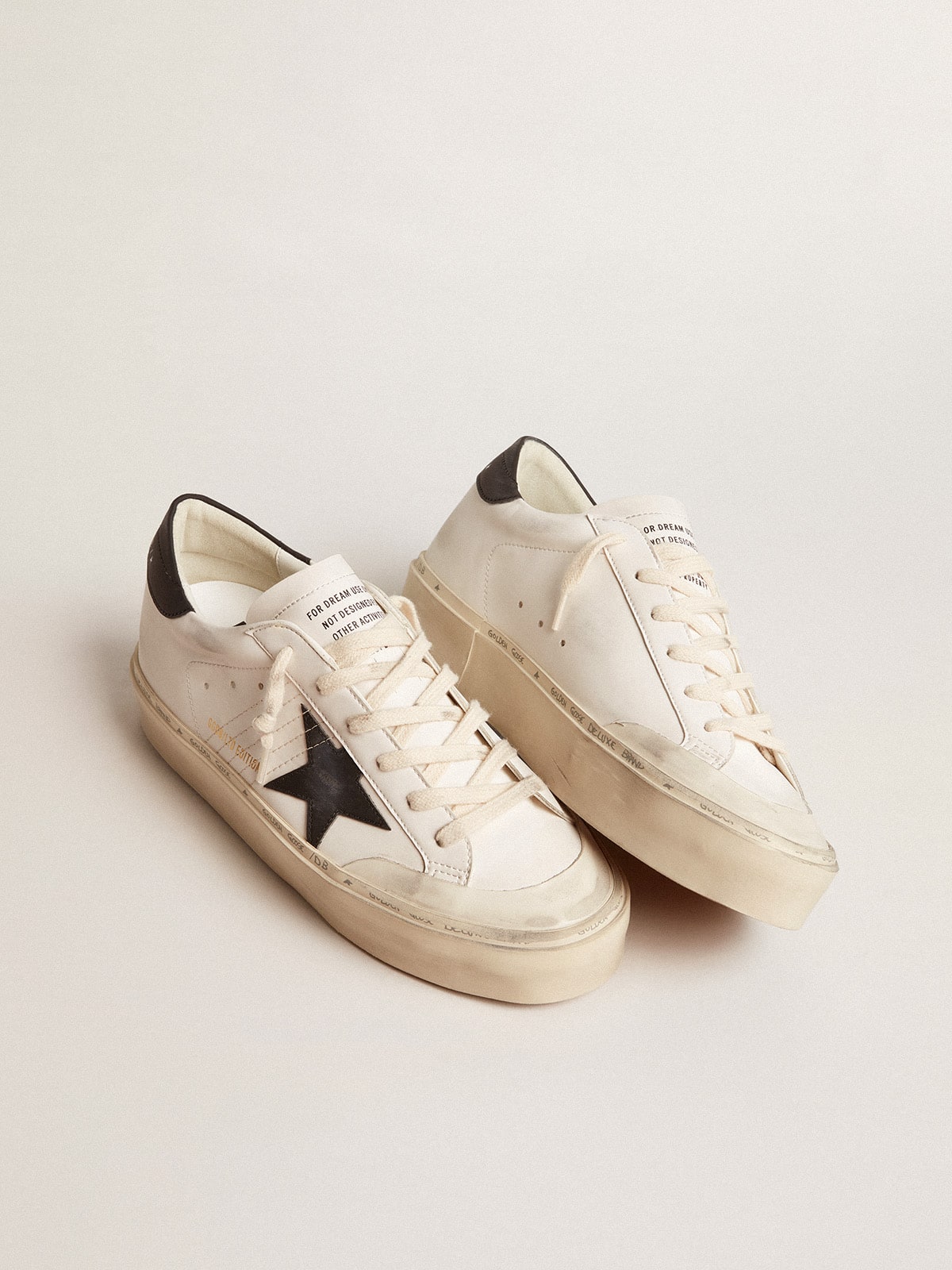 Woman's white bio-based Hi Star LTD with black bio-based star and heel tab