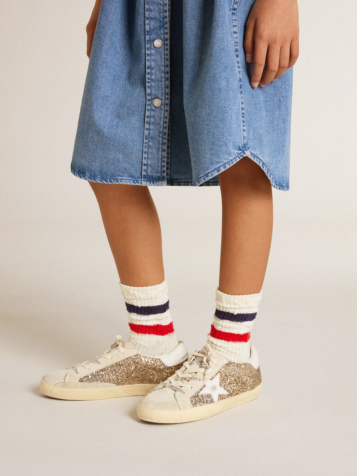 Super-Star Young in gold glitter with white leather star and heel tab
