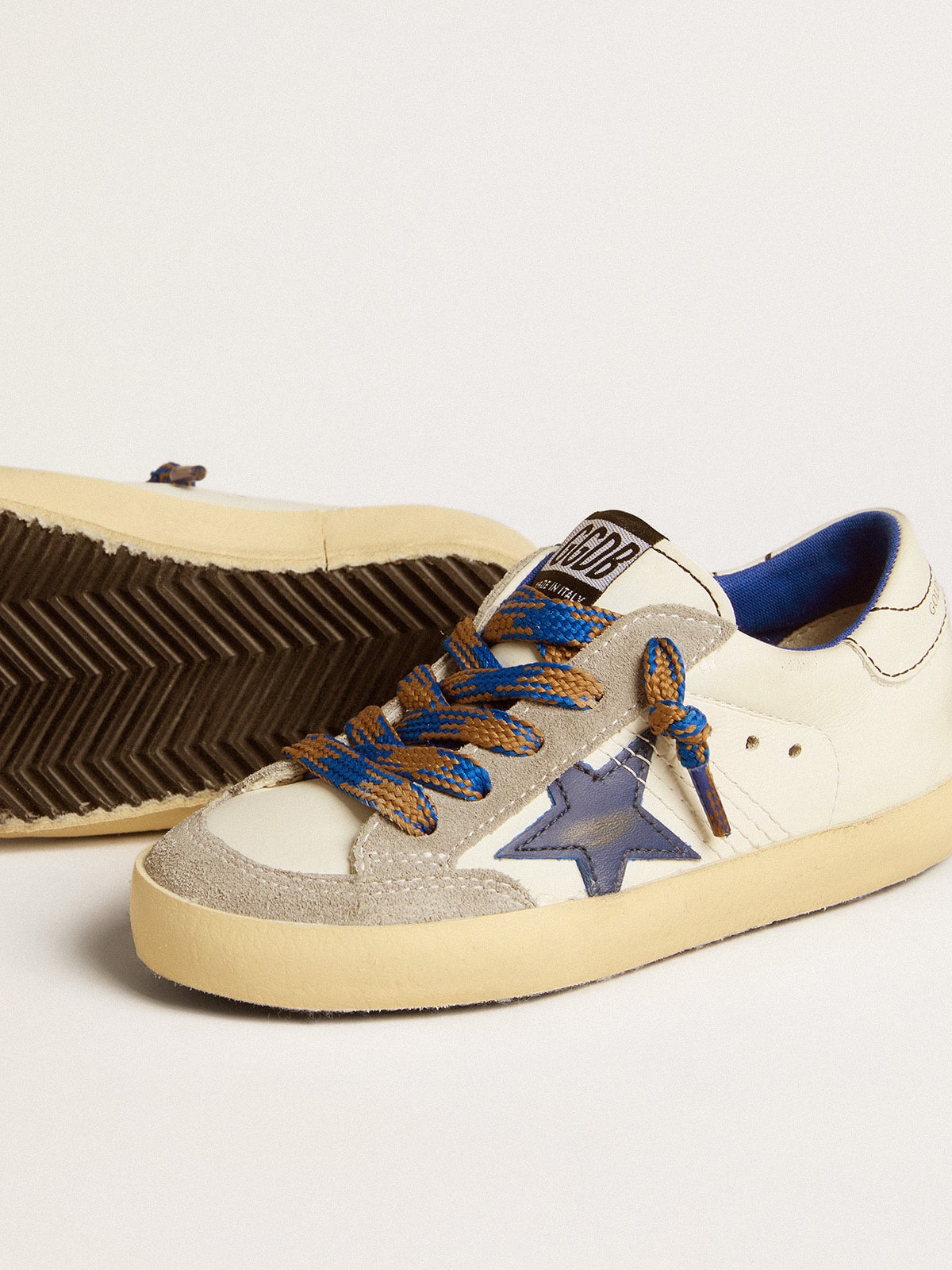 Super-Star Young with blue leather star and ice-gray suede inserts