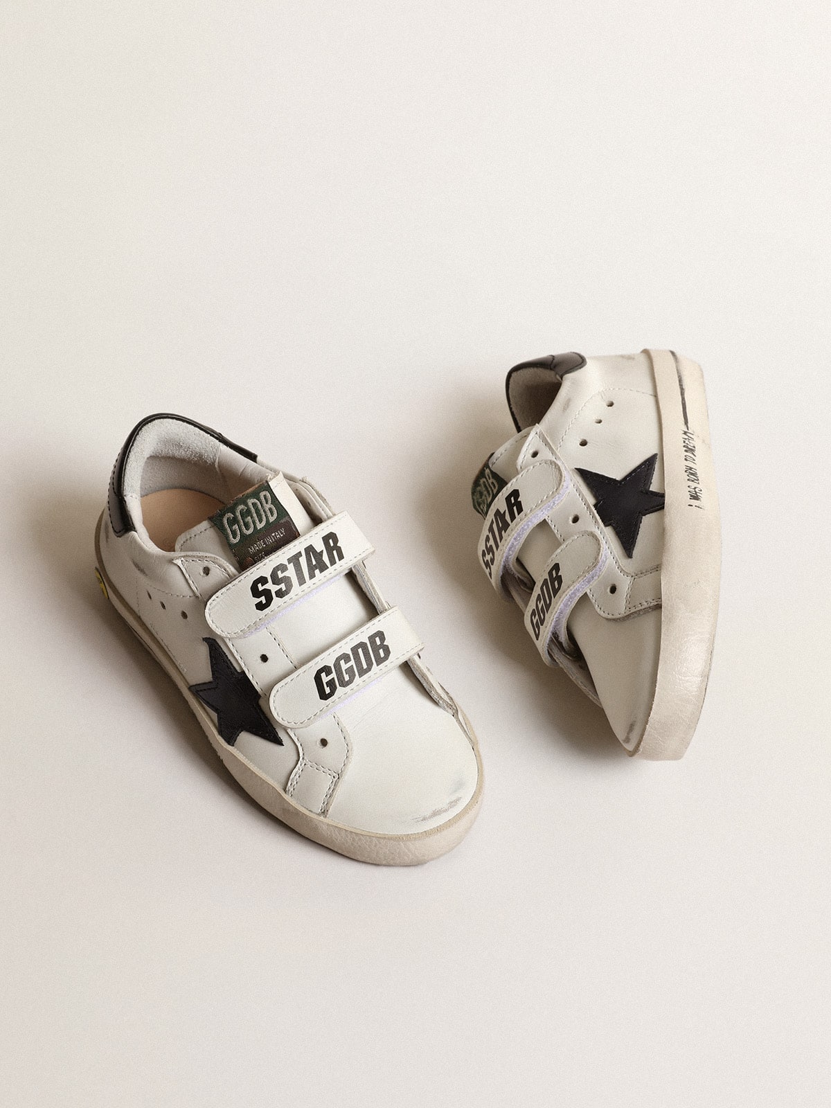 Old School Young with metallic leather star and black heel tab
