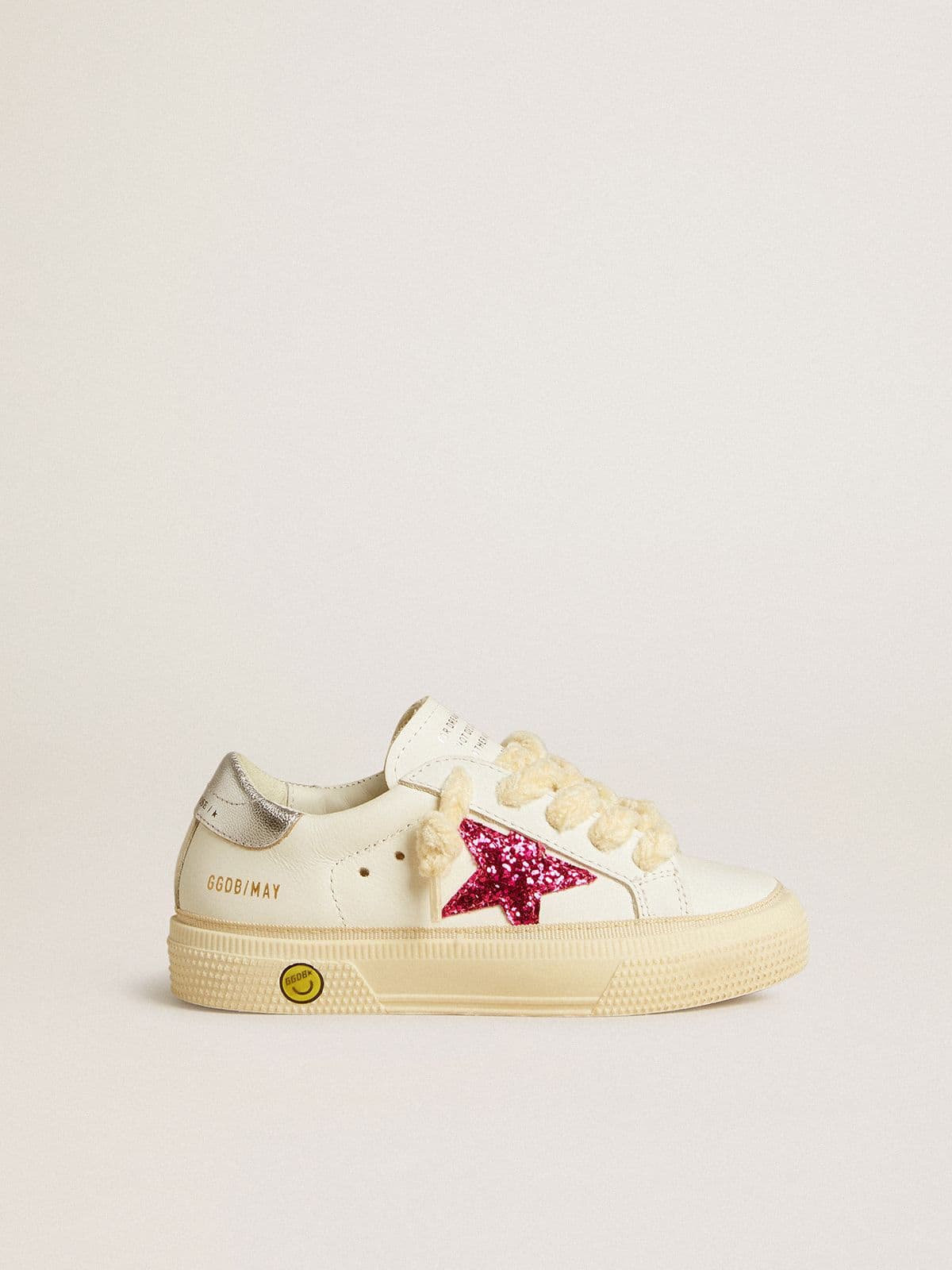 May Young with fuchsia glitter star and metallic leather heel tab