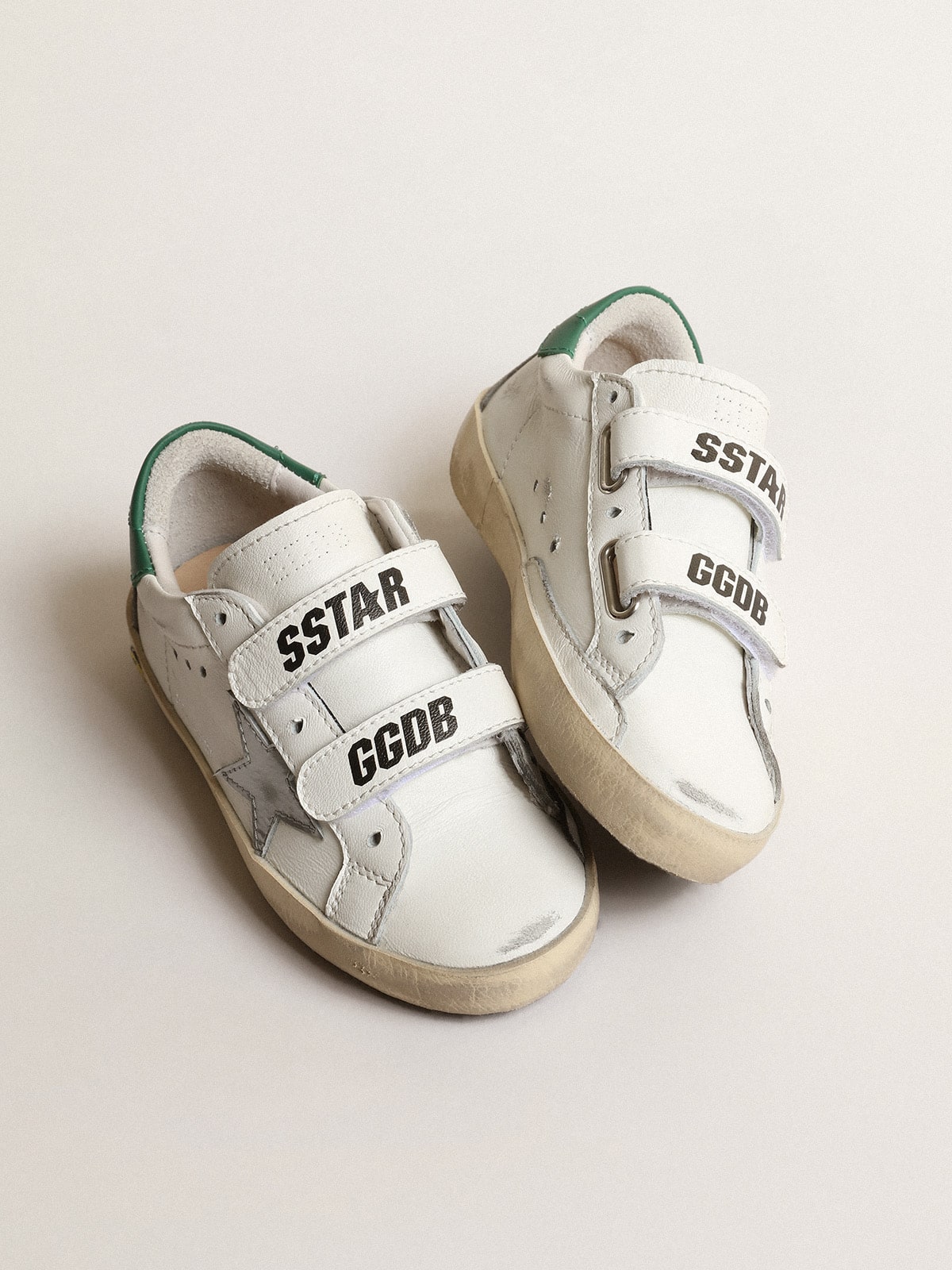 Old School Young with metallic leather star and green heel tab