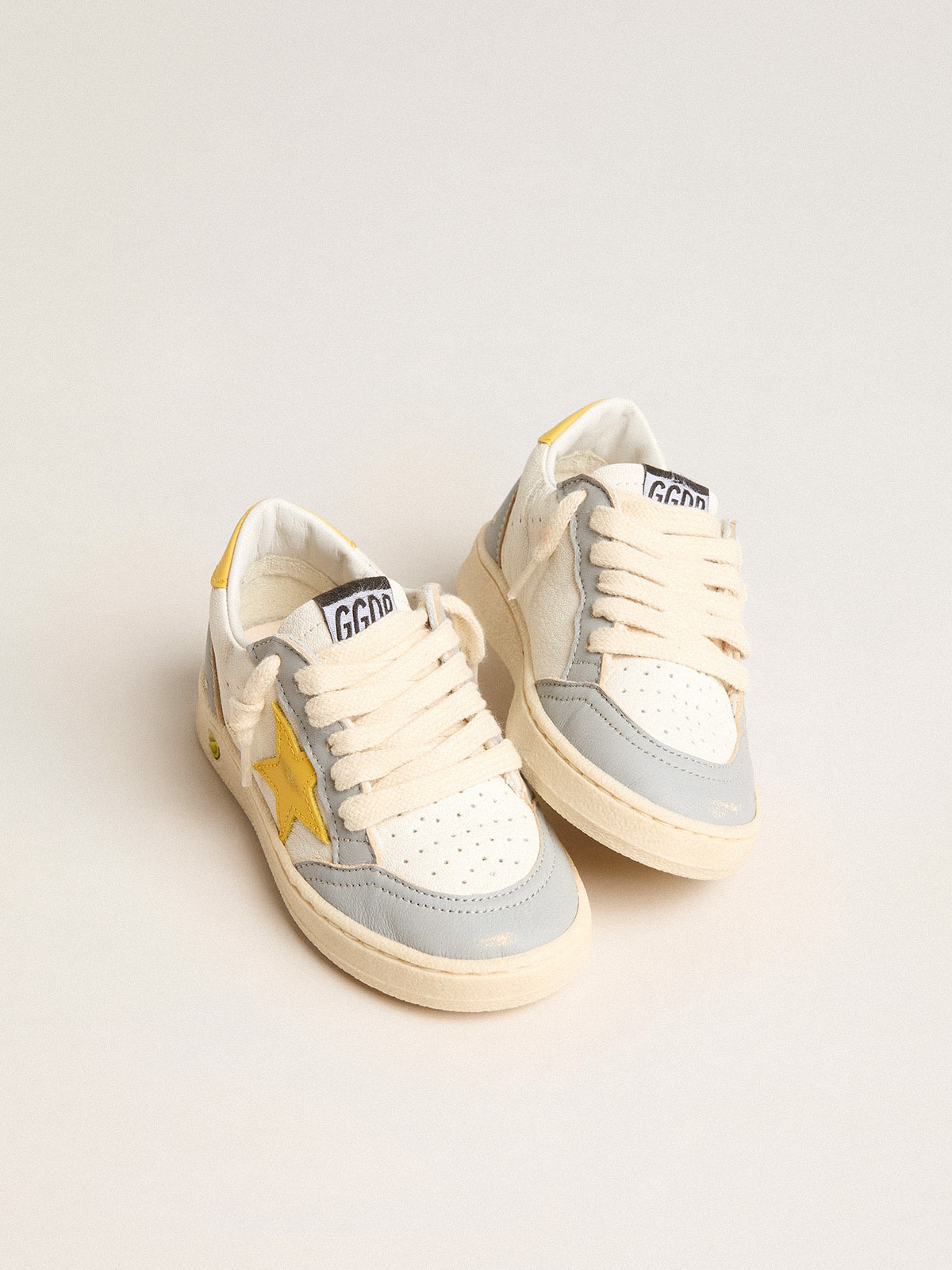 Ball Star Junior with yellow leather star and heel tab