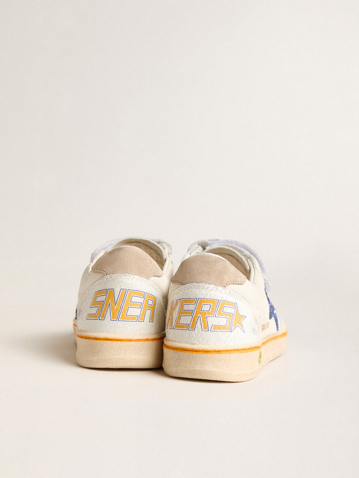 Young Ball Star with blue glitter star and beige suede heel tab