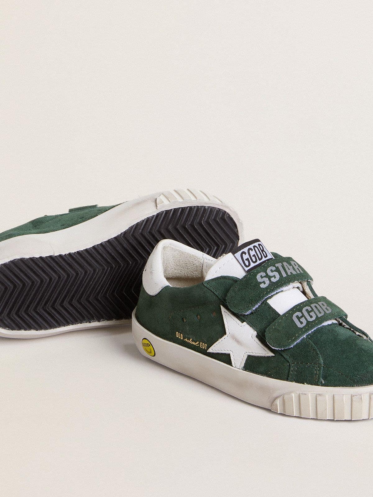Old School Young in green suede with white leather star and heel tab